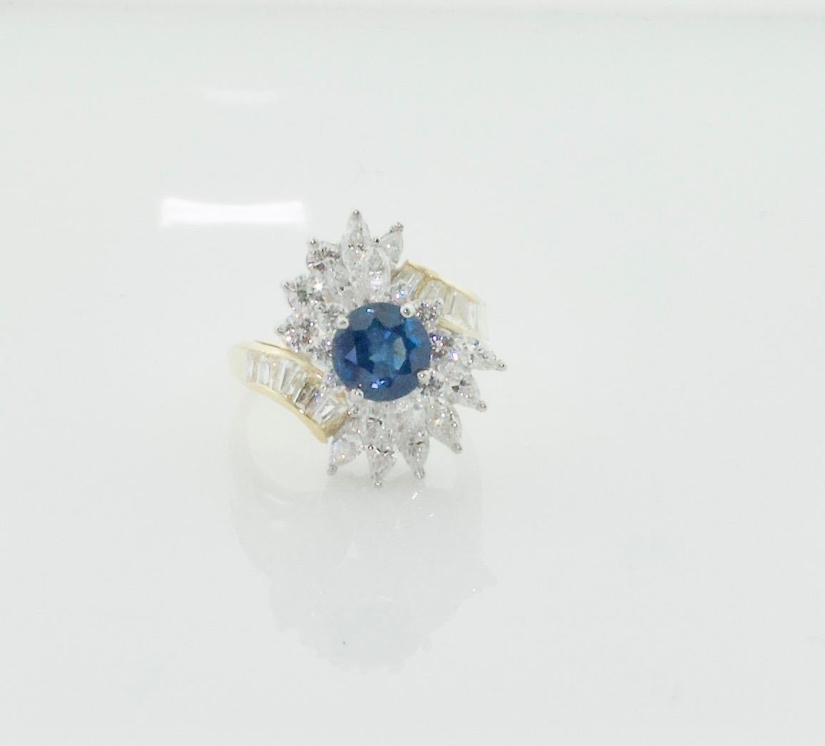 Marquise Cut Sapphire and Diamond Cocktail Ring by Terrell & Zimmelman, circa 1970s For Sale