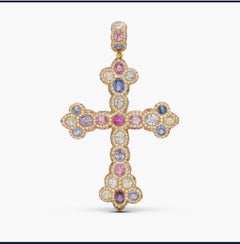Colgante de cruz con zafiros y diamantes