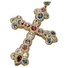 Colgante de cruz con zafiros y diamantes