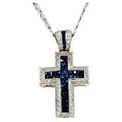 Collier pendentif croix en saphir et diamants en or blanc 14 carats 