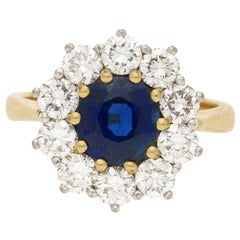 Sapphire and Diamond Diana Style Cluster Engagement Ring in 18 Karat Yellow Gold