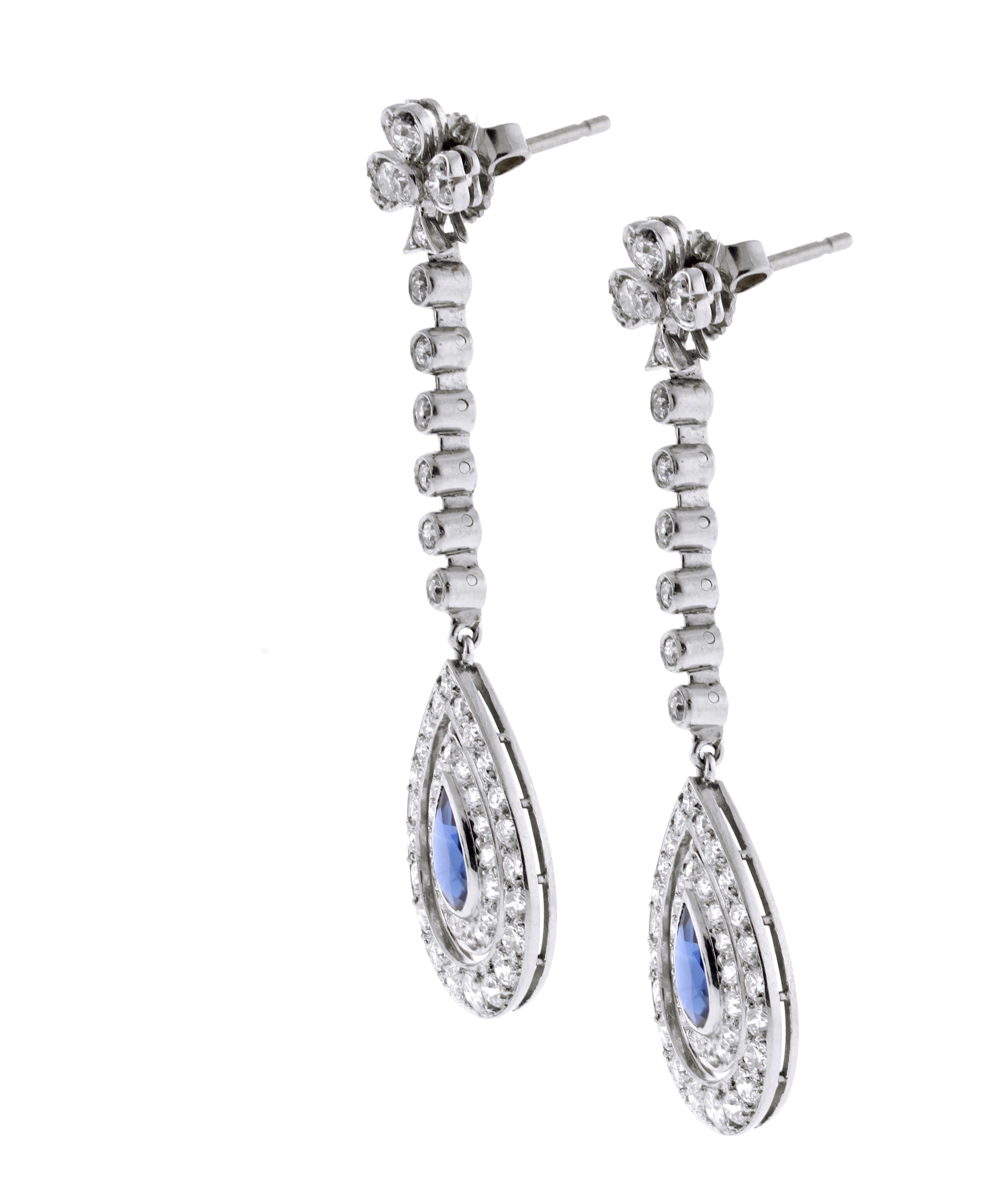 A pair of Art Deco pear shape sapphire and diamond drop earrings.

♦ Metal: Platinum
♦ 2 Sapphires=1.20 carats
♦ 98 old European cut diamonds=2 carats
♦ Circa 1935
♦ 1 7/8ths of an inch long
♦ Packaging: Pampillonia presentation box 
♦ Condition: