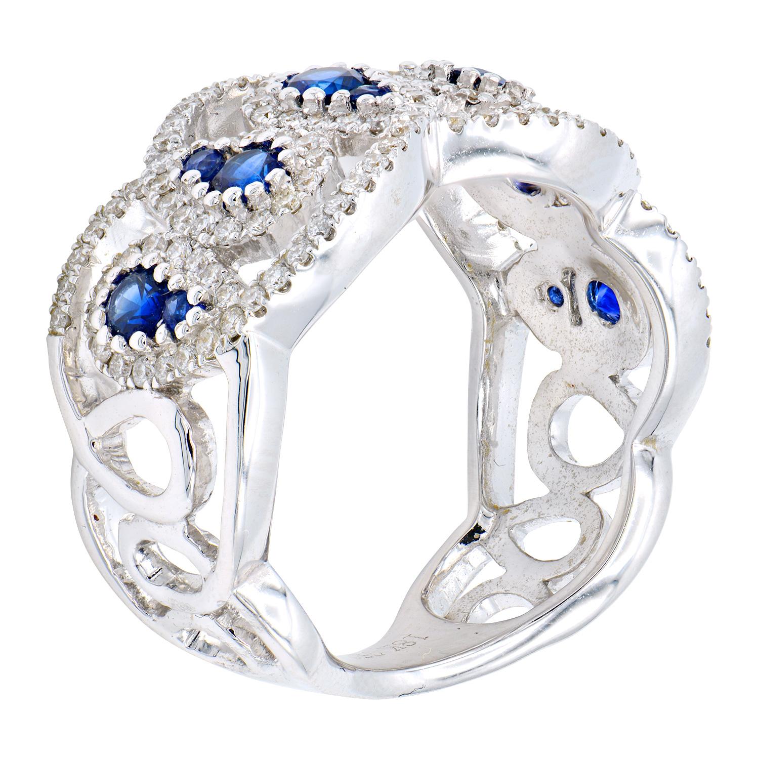 This unique and beautiful ring is made from 2 sizes of sapphires and diamonds. There are 12 sapphires totaling 0.79 carats which are stacked in a drop shape which are surrounded by beautifully designed 140 round VS2, G color diamonds totaling 0.67