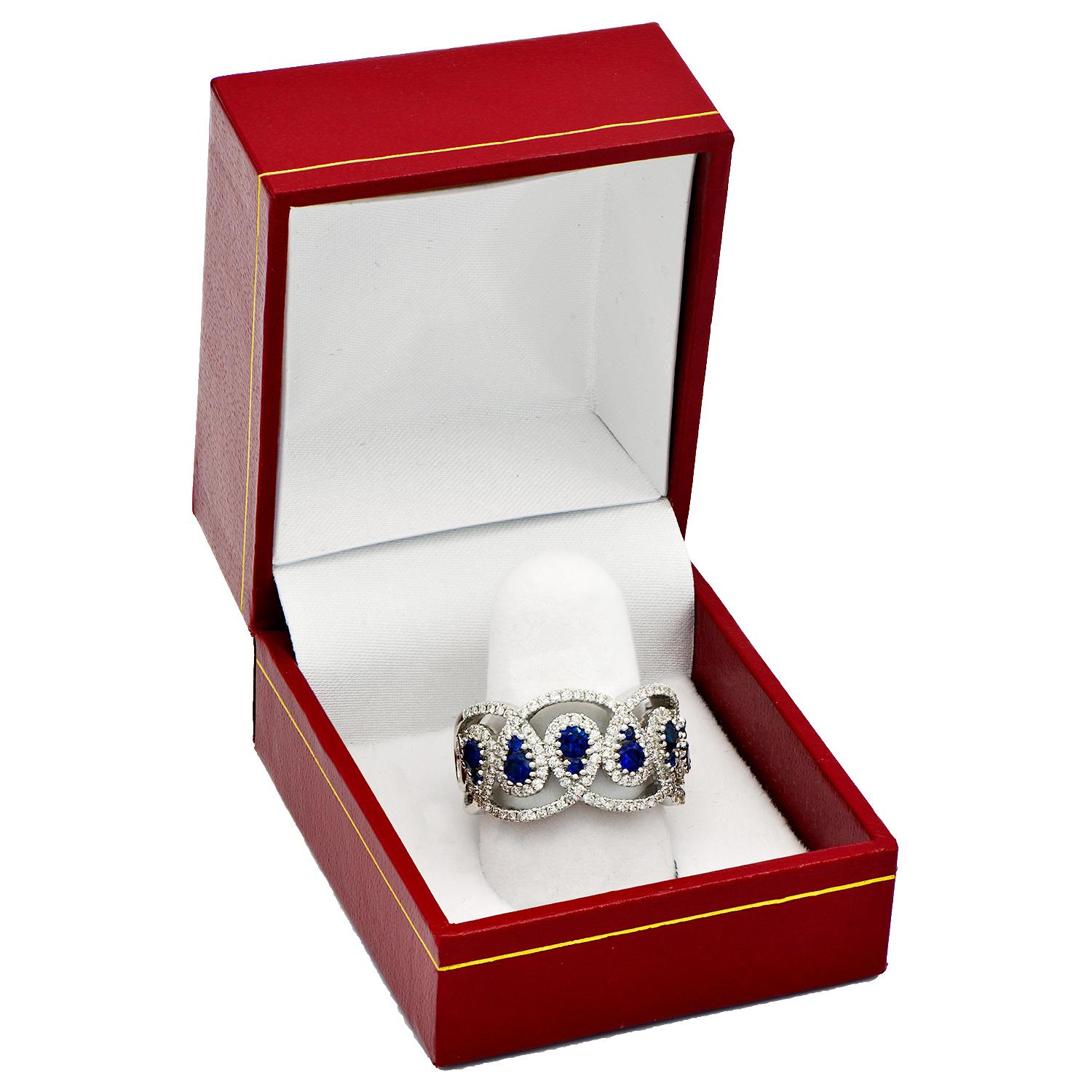 Contemporary Sapphire and Diamond Drop Ring For Sale