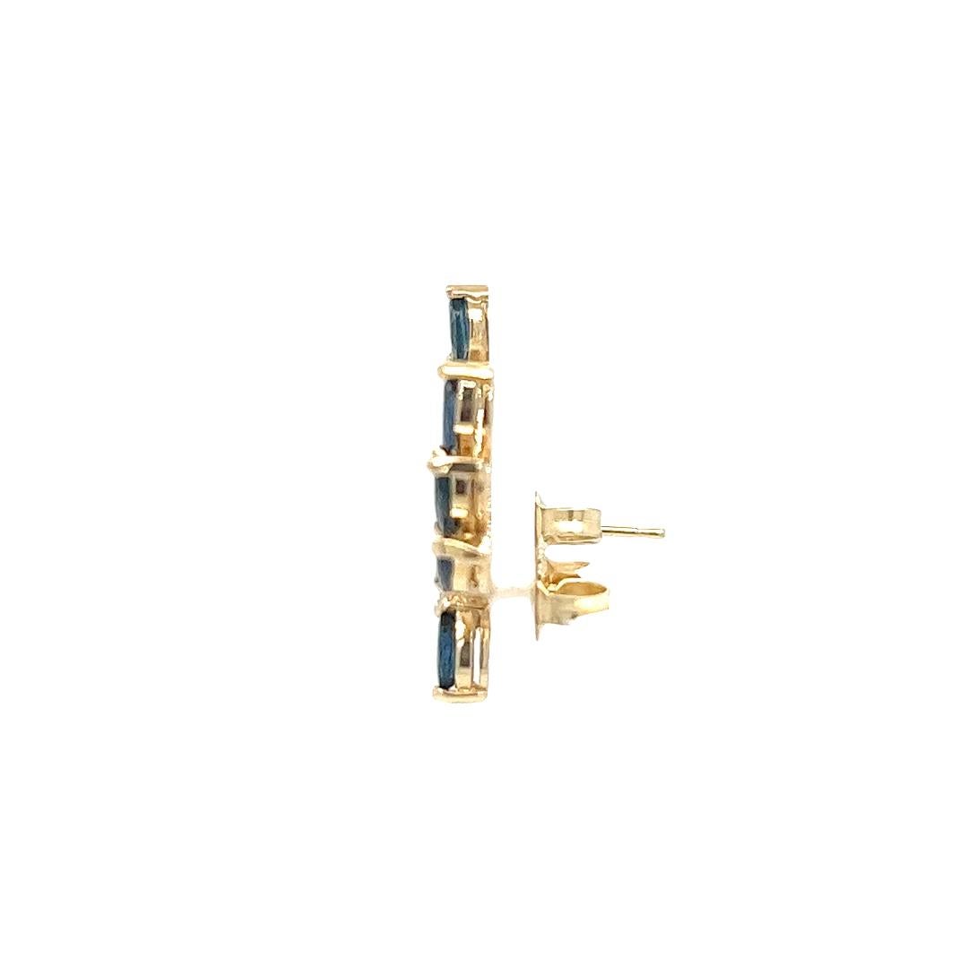 Marquise Cut Sapphire and diamond ear crawler in yellow gold