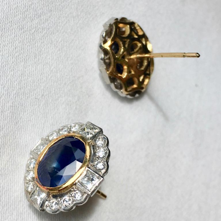 Charming oval faceted sapphires set in 18 carat yellow and white gold with diamond surround with brilliant and square cut stones. Please note this item is made to order and a similar but not identical piece can be made. Allow four weeks to delivery.
