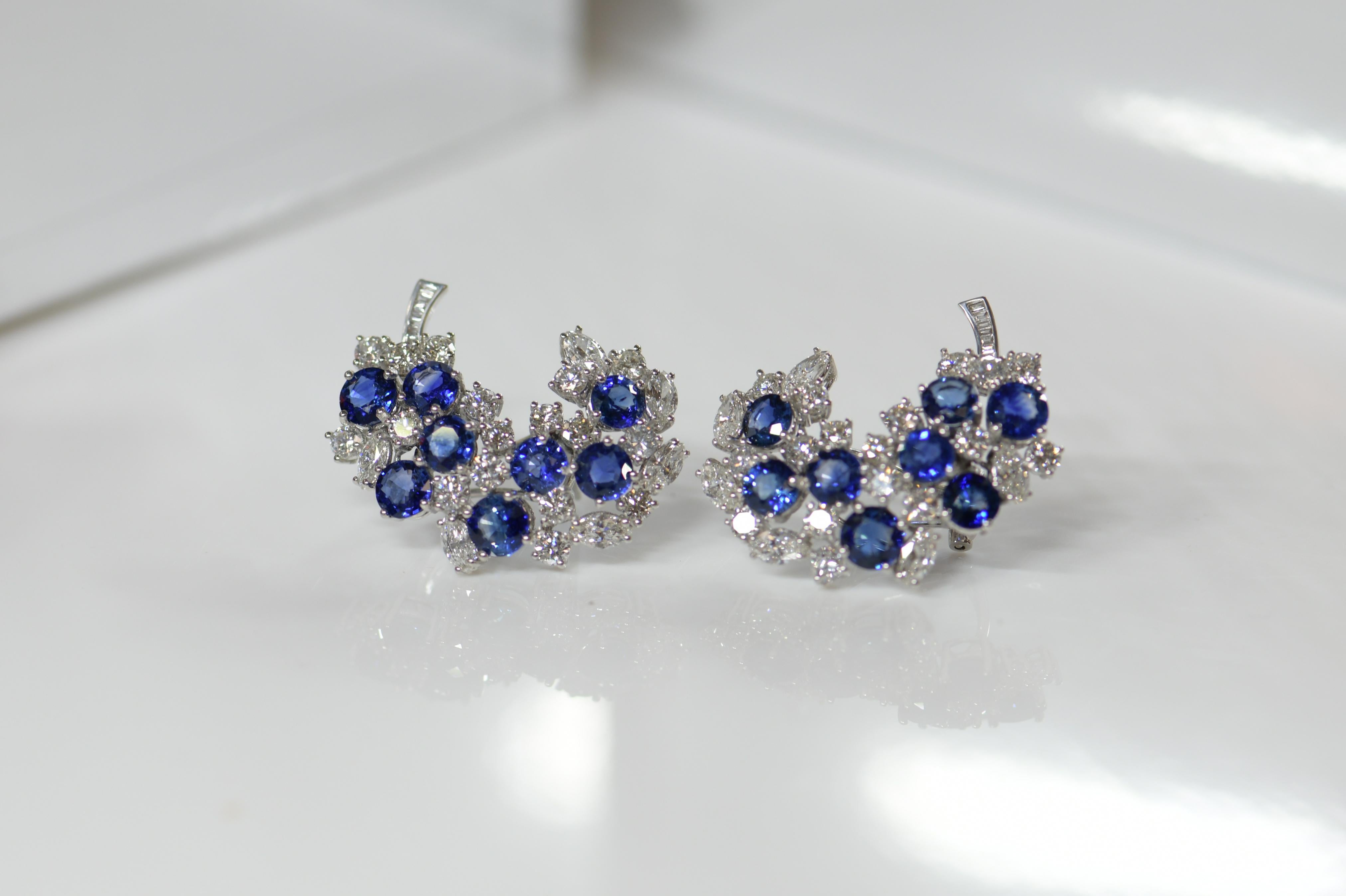 This is high-end, top quality craftsmanship and design. The sapphires are a rich royal blue with excellent clarity. The different diamond shapes of Round, marquise and baguette compliment each other and the sapphires perfectly. The variety adds