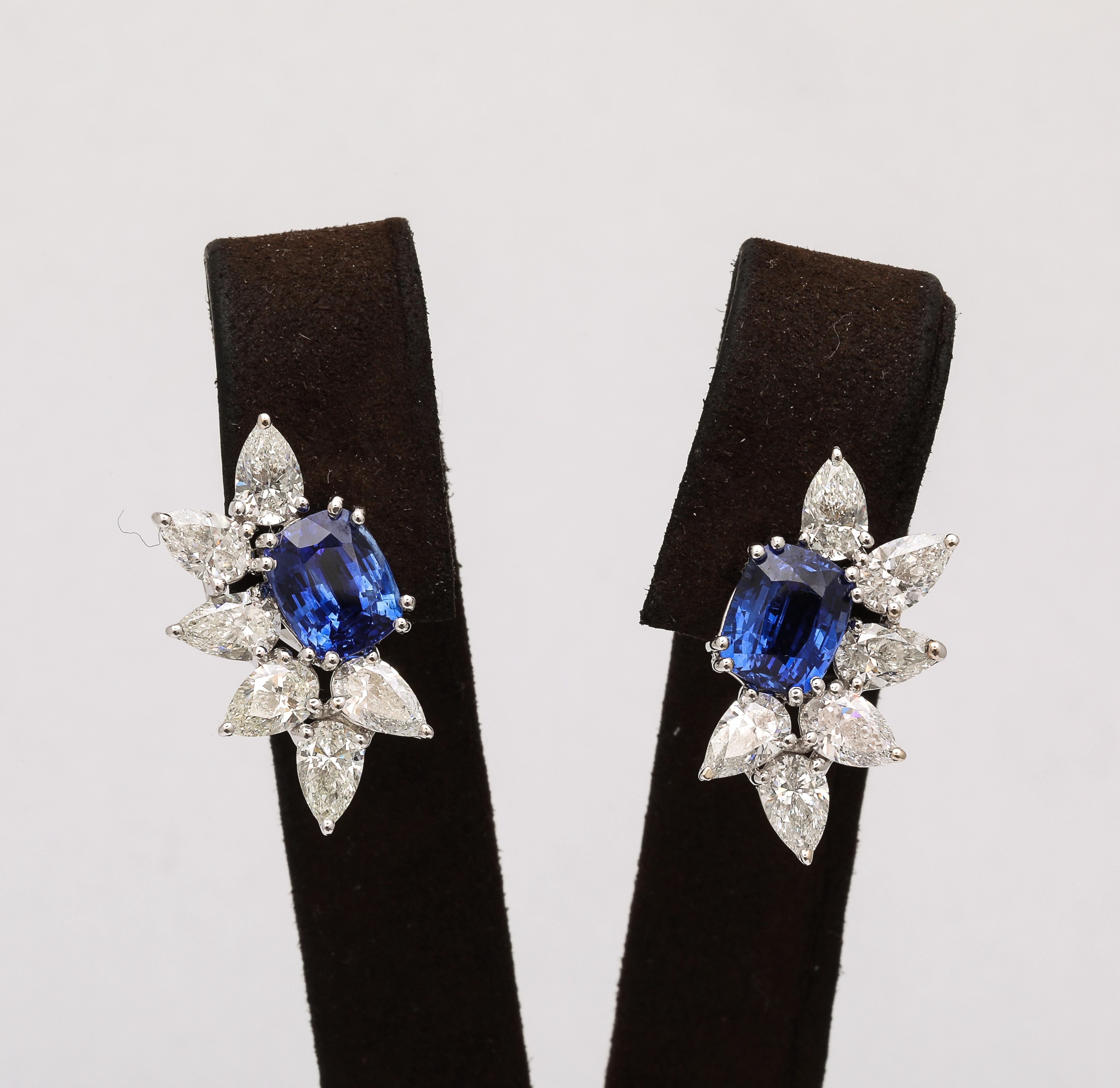 
A fabulous design! 

8.11 carats of certified Ceylon Blue Cushion cut Sapphires. 

6.55 carats of white pear shaped diamonds beautifully set half way along the sapphires. 

Certified by Christian Dunaigre of Switzerland - available for serious