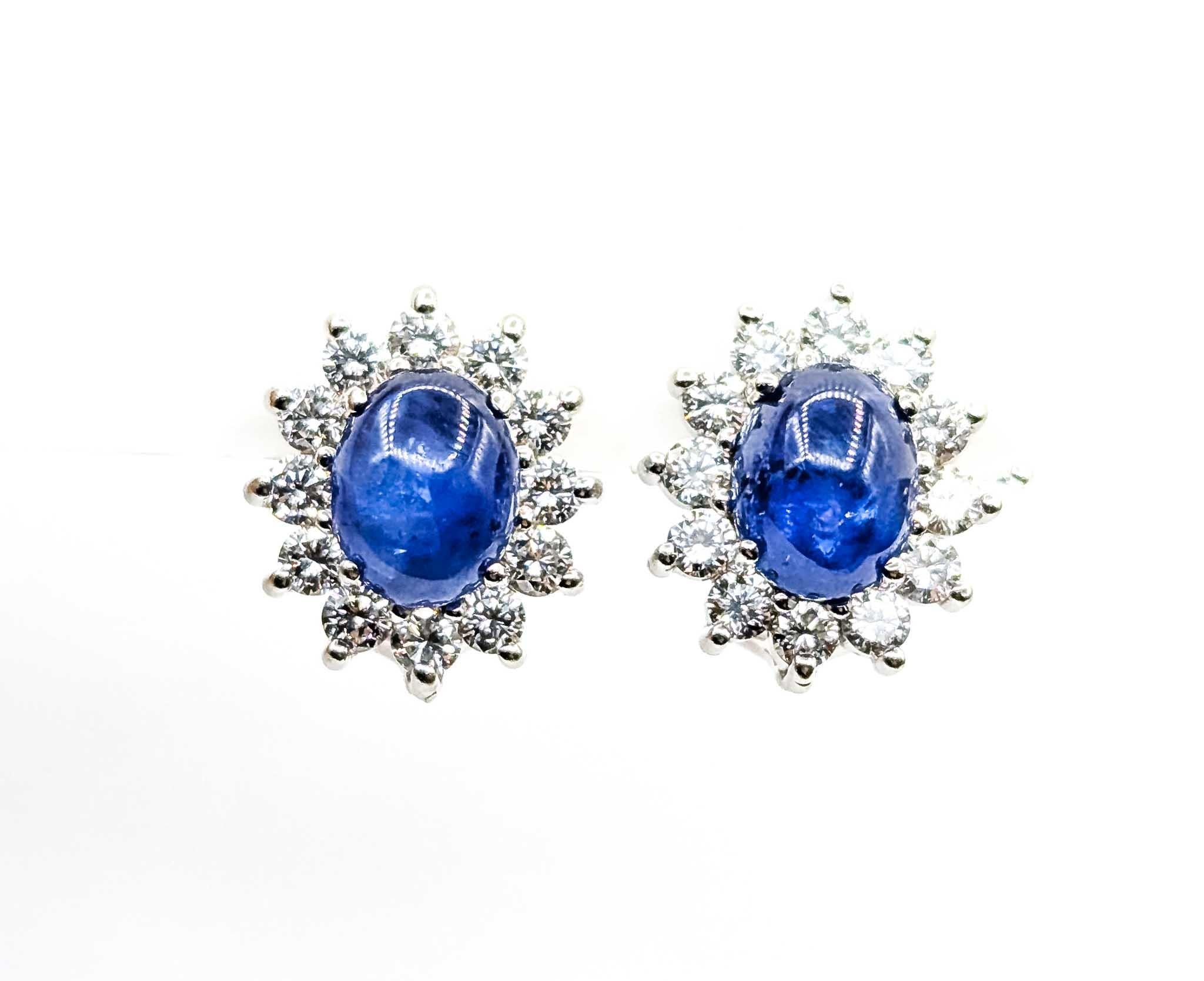 Sapphire and Diamond Earrings in 14k White Gold

Introducing these exquisite sapphire earrings, masterfully crafted in 14k white gold with a halo omega back setting. These earrings showcase a striking combination of gemstones, featuring a