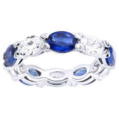 Anillo Eternidad Zafiro y Diamante Talla Oval 5,8 Quilates Oro Blanco 18K