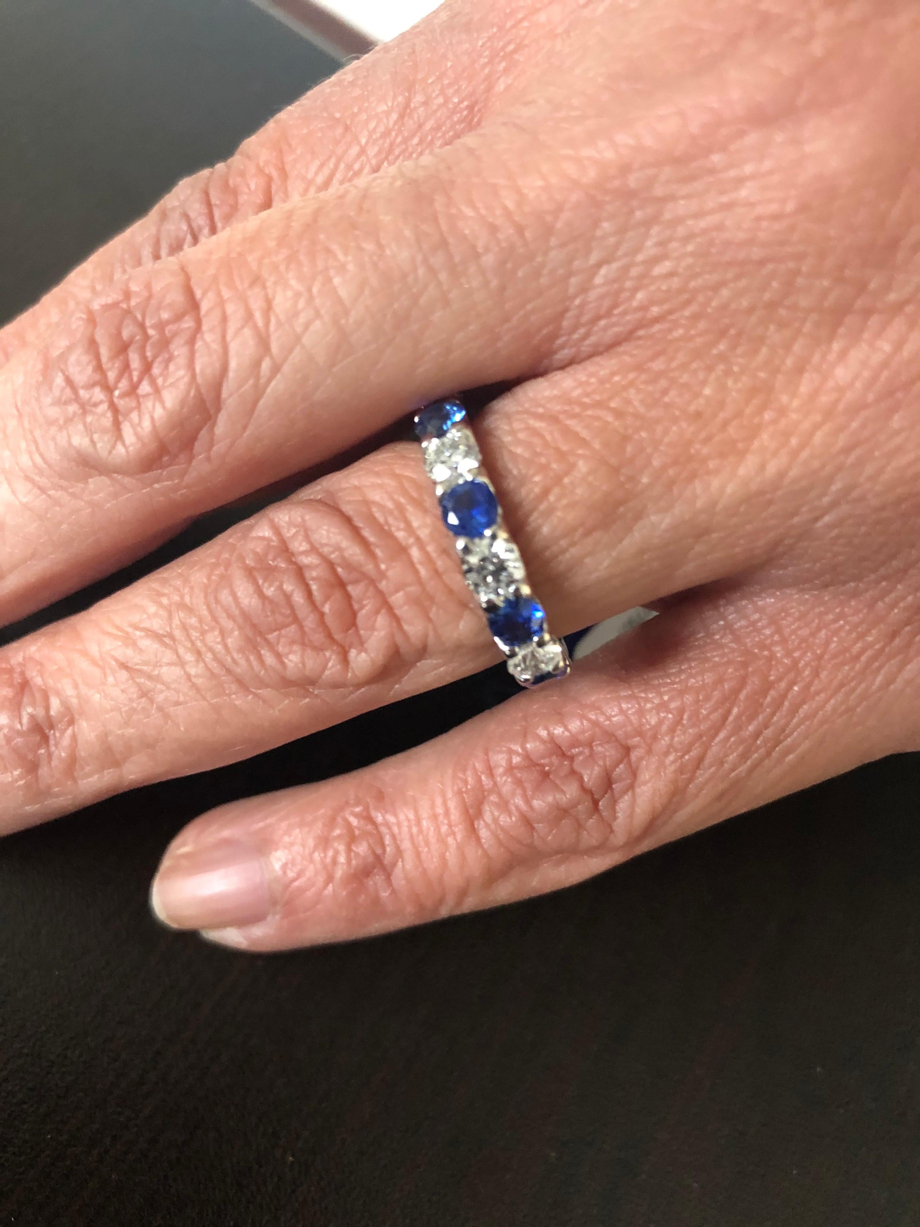 Sapphire and diamond alternating set in 14K white gold. The eternity band is a U-prong low setting. The sapphires are Ceylon and the total weight is 1.73 carats. The diamonds are 1.57 carats total. The color of the stones are G-H, the clarity is