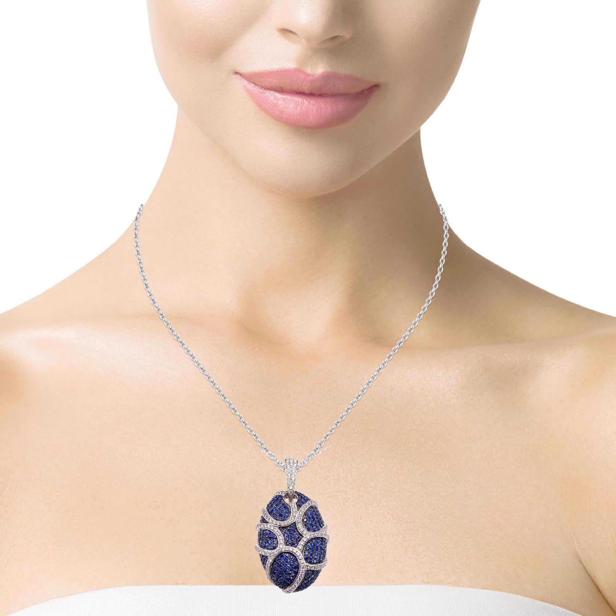 This stunning one of a kind pendant has is the perfect accessory that will catch everyones eye. There are 300 Ceylon Sapphires and 141 brilliant cut diamonds all pave set in 18 karat white gold. This pendant has detailed tags attached and comes in a