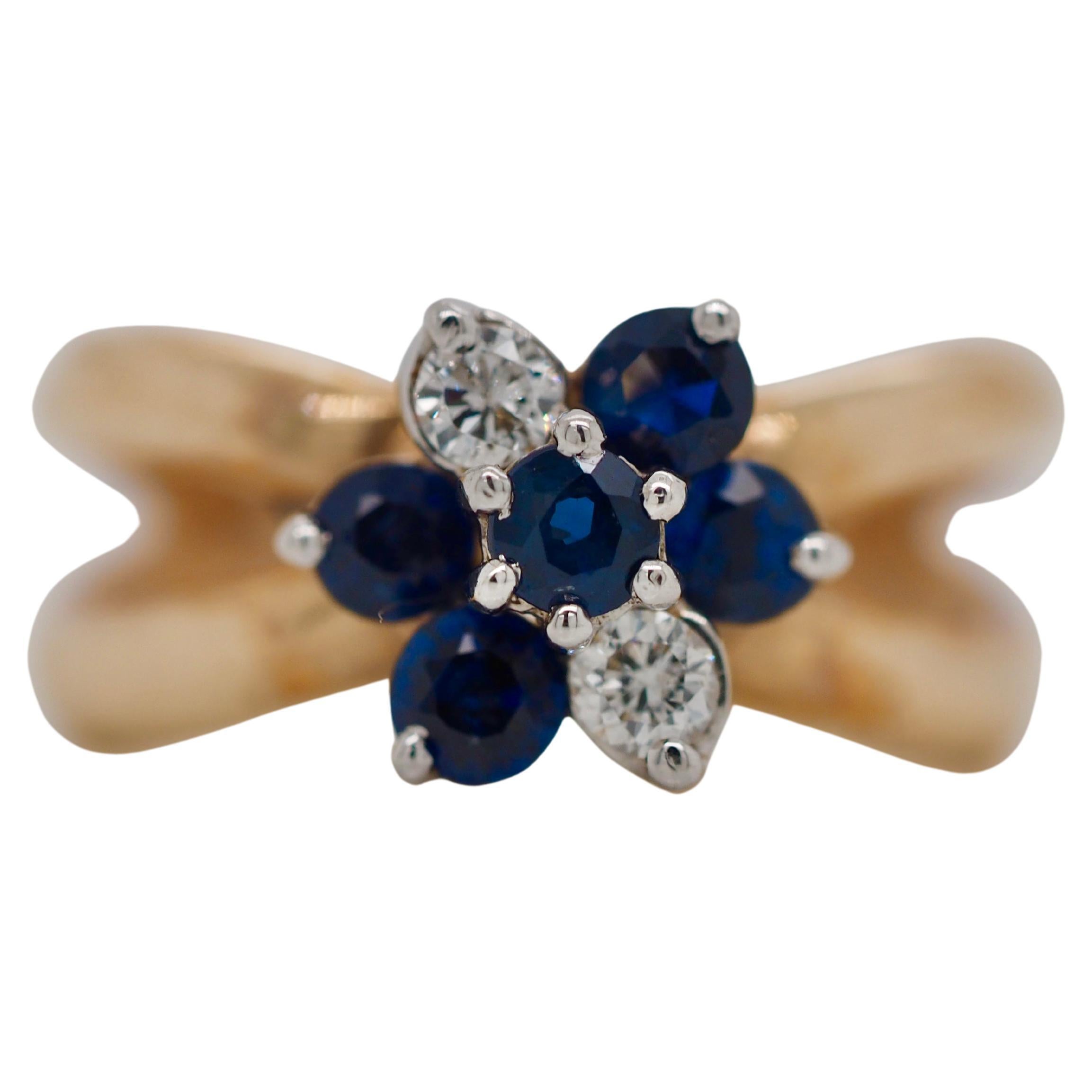 Sapphire and Diamond Flower Halo Crossover Retro Ring in 14 Karat Yellow Gold For Sale