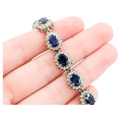Bracciale aureola con zaffiro e diamante in oro bianco