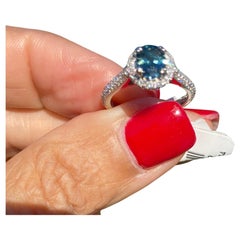 Sapphire and Diamond Halo Ring 18 Karat Gold 2.88 Carat