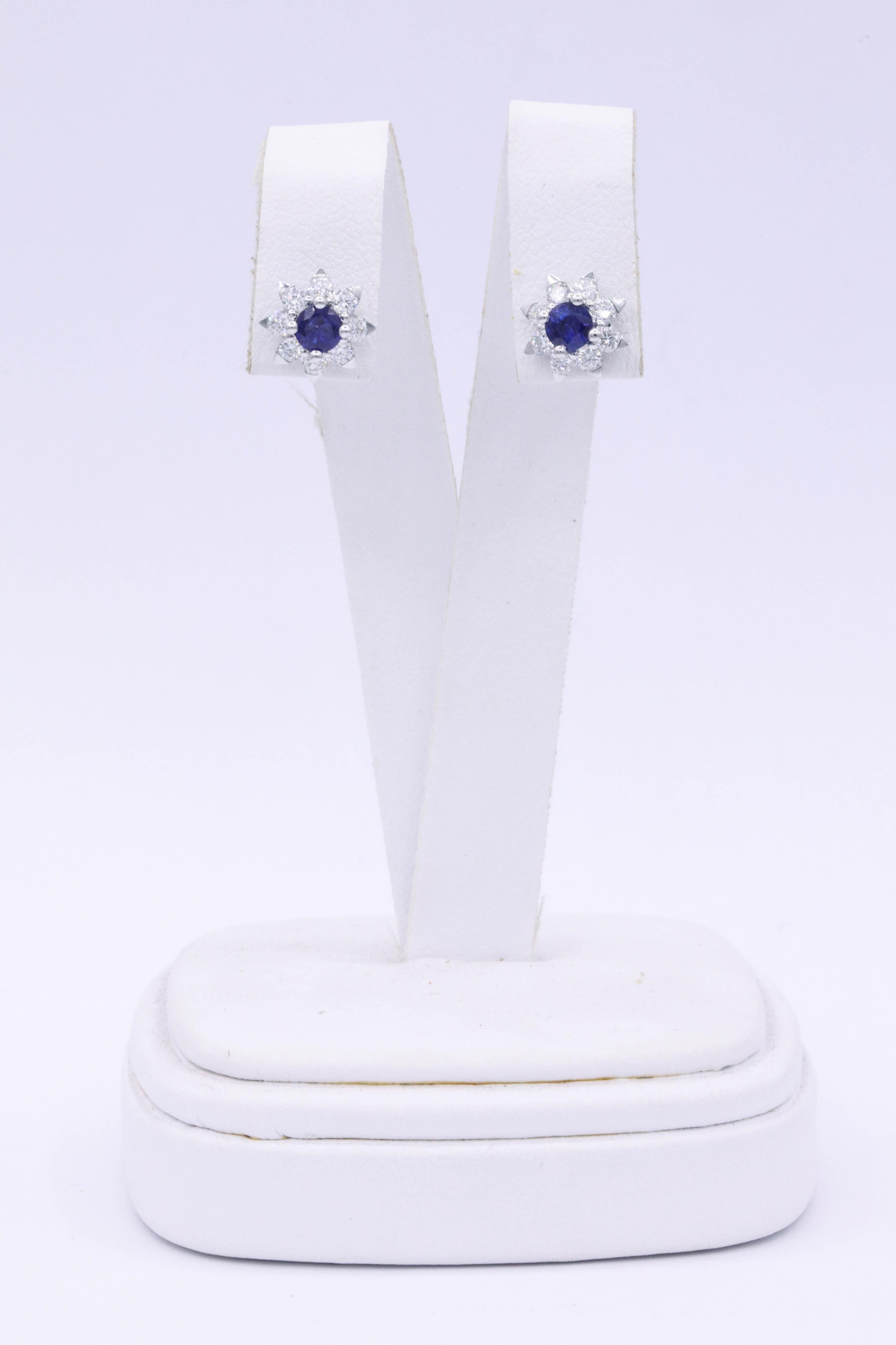 18K White Gold 2 Sapphires 0.66 Cts.
16 round diamonds 0.60 cts.
3/8