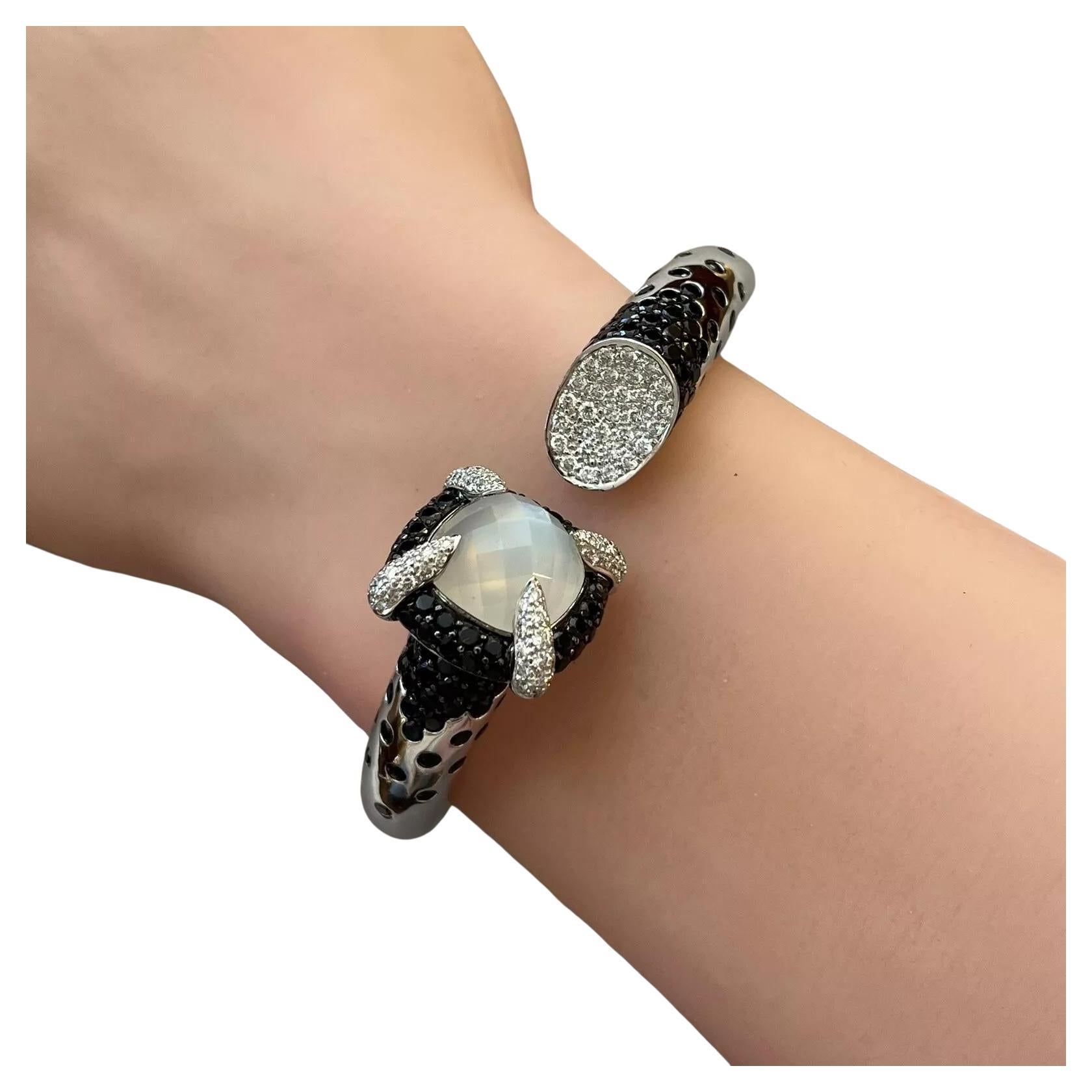 Bracciale a cerniera con zaffiro e diamante in oro bianco 18k