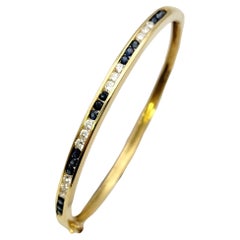 Sapphire and Diamond Hinged Narrow Bangle Bracelet in 14 Karat Yellow Gold