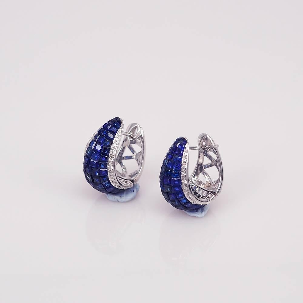 The top quality Sapphire which make in invisible setting.We set the stone in perfection as we are professional in this kind of setting more than 40 years.The invisible is a highly technique .We cut and groove every stone .Therefore; we can guarantee