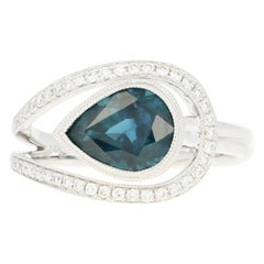 Sapphire and Diamond Love Knot Halo Ring, 14 Karat White Gold Pear 2.83 Carat
