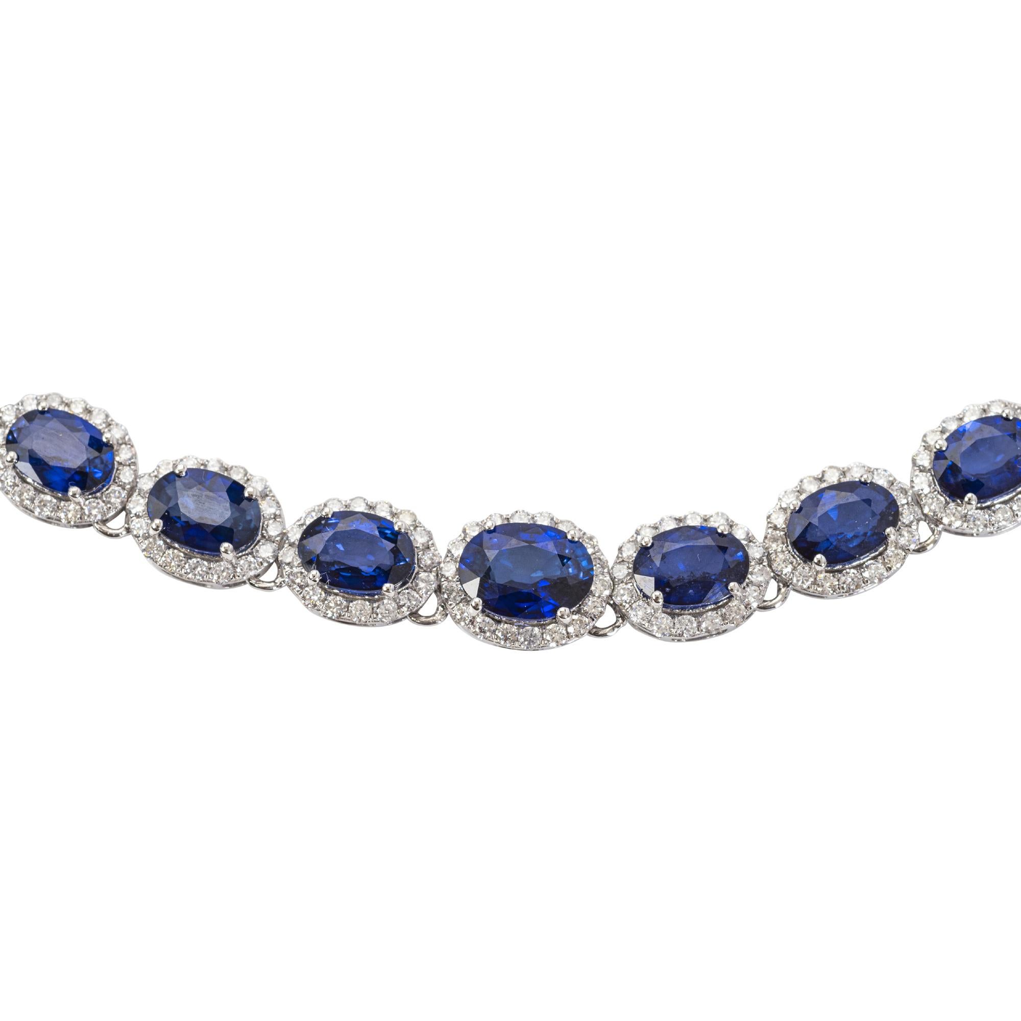 
Sapphire and Diamond Necklace
Designed as a graduated line of fifty-one oval-cut sapphires weighing approximately 32.74 carats in total, each to the surround embellished with brilliant-cut diamonds weighing approximately 7.65 carats in total