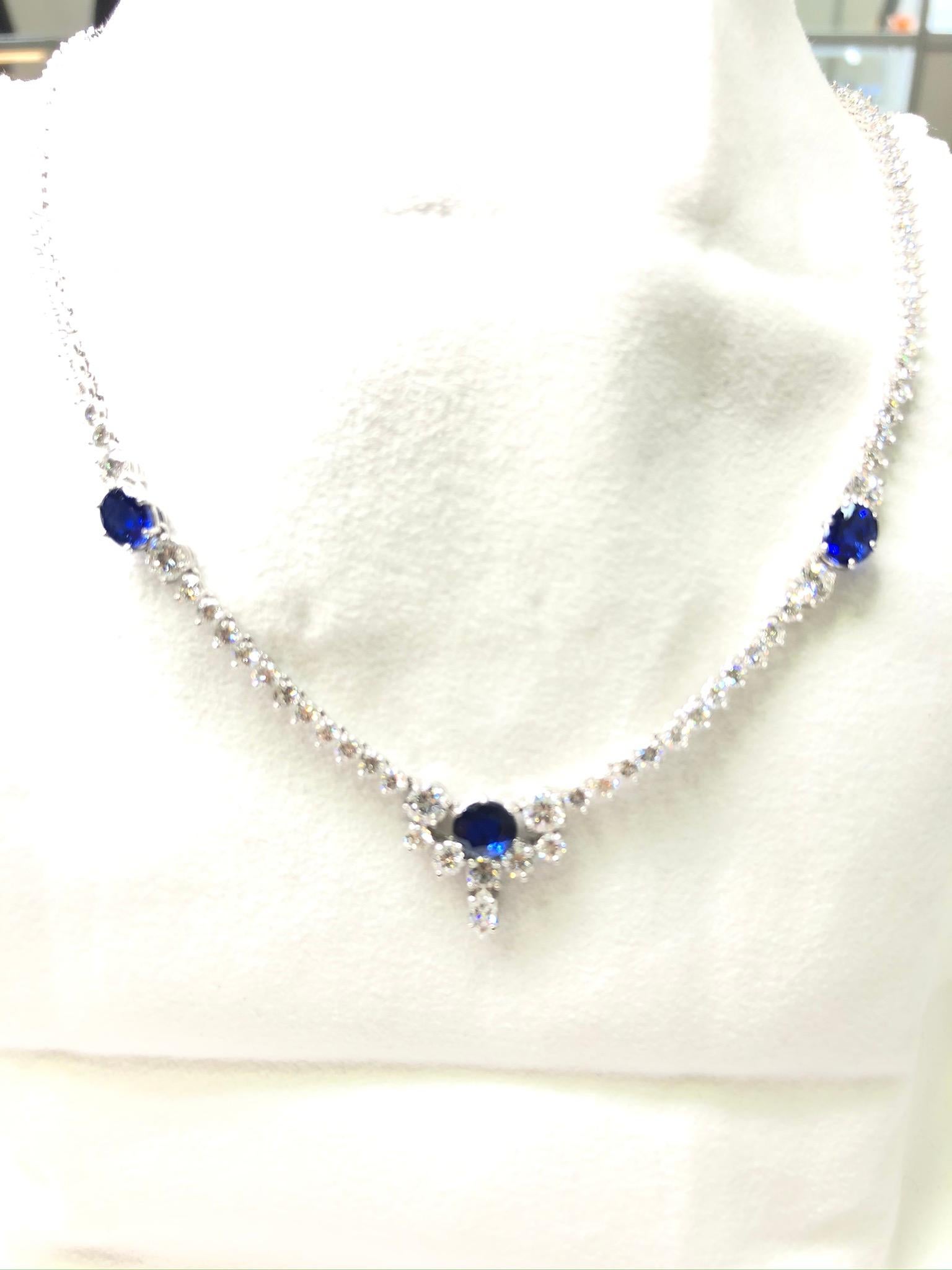This necklace is fashioned out of 18 karat white gold and is set with approximately 6.44 carats of sapphires and 144 diamonds. Gross weight is approximately 16 grams. 