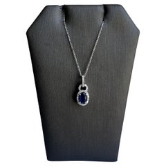 Sapphire and Diamond Necklace in 10kt White Gold - 0.14ctw Diamonds, 6x4mm Saph.