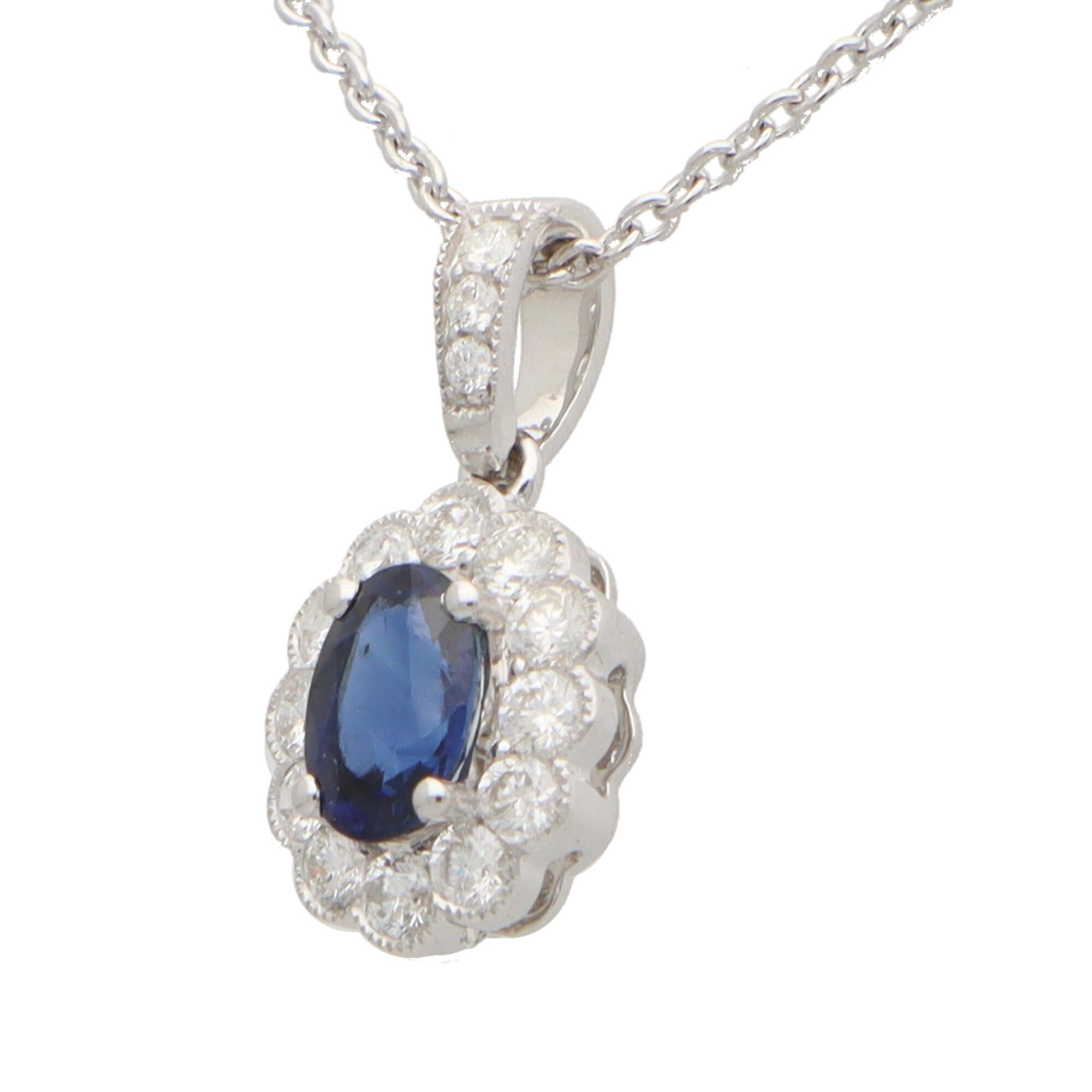 Oval Cut Sapphire and Diamond Oval Pendant Set in 18k White Gold