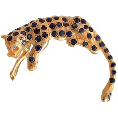 Vintage Sapphire and Diamond Panther in 14 Karat Yellow Gold