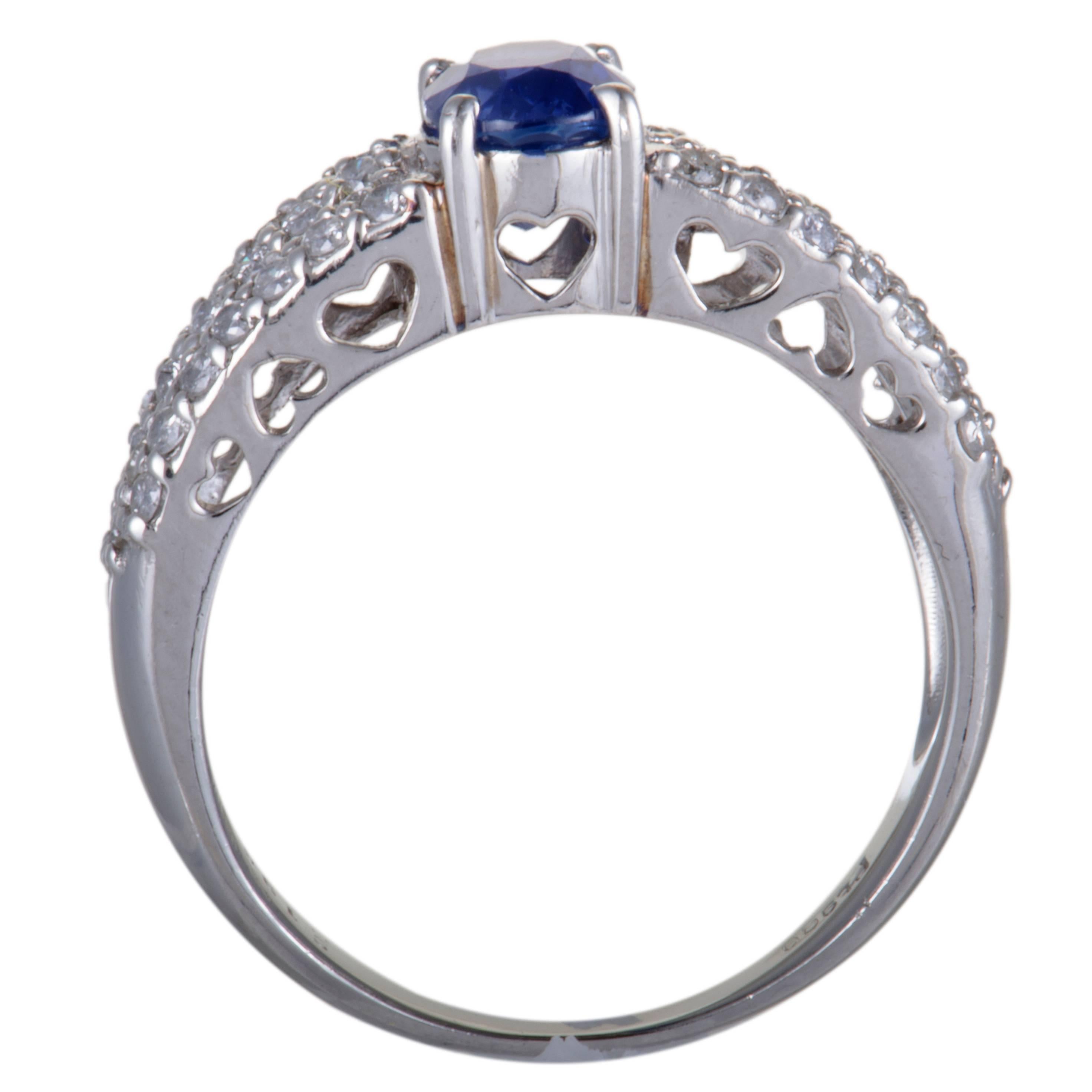 This mesmerizing ring features a classic design and compels with its luxurious décor. The fabulous ring is made of classy platinum and adorned in a sparkling pave of 0.57ct diamonds with a captivating blue sapphire in the center, weighing