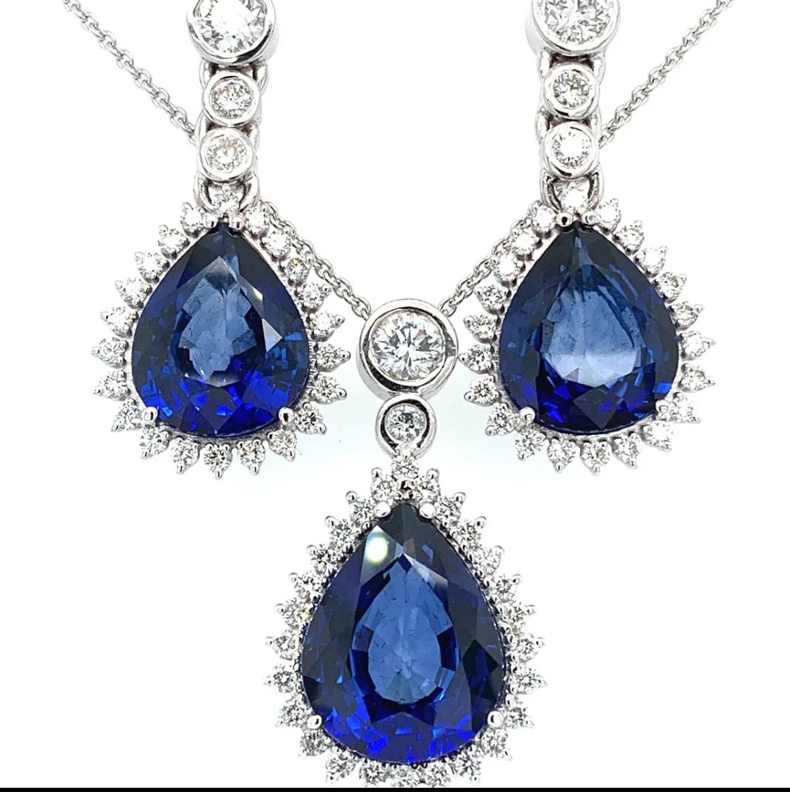 Sapphire and diamond pear cut art deco drop necklace and earrings set 18k gold
Gorgeous pear shaped blue sapphire and diamond halo cluster surrounding each jewellery piece all mounted in 18k white gold
Sapphire pear cut treated gemstone total weight