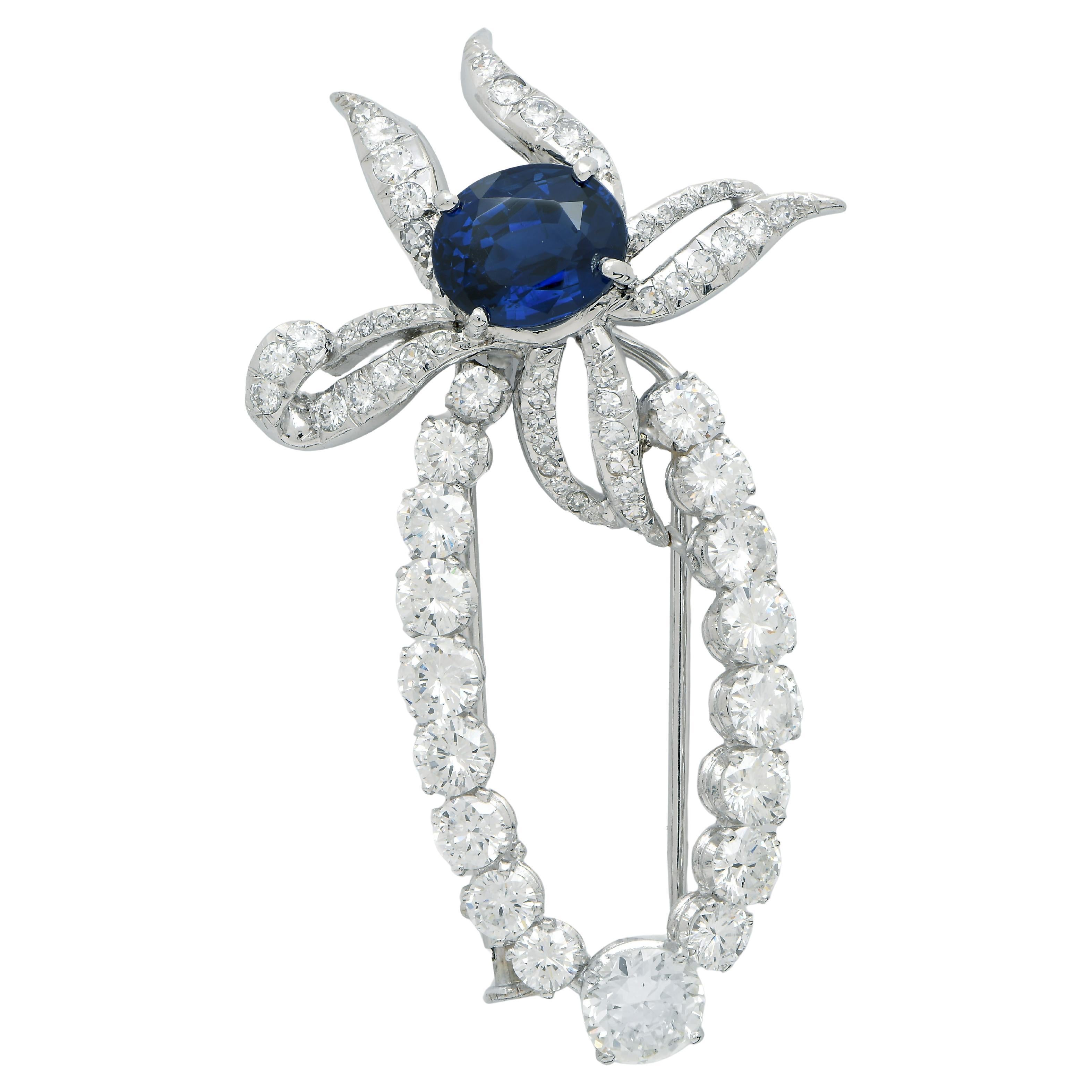 Broche de platino con zafiro y diamantes