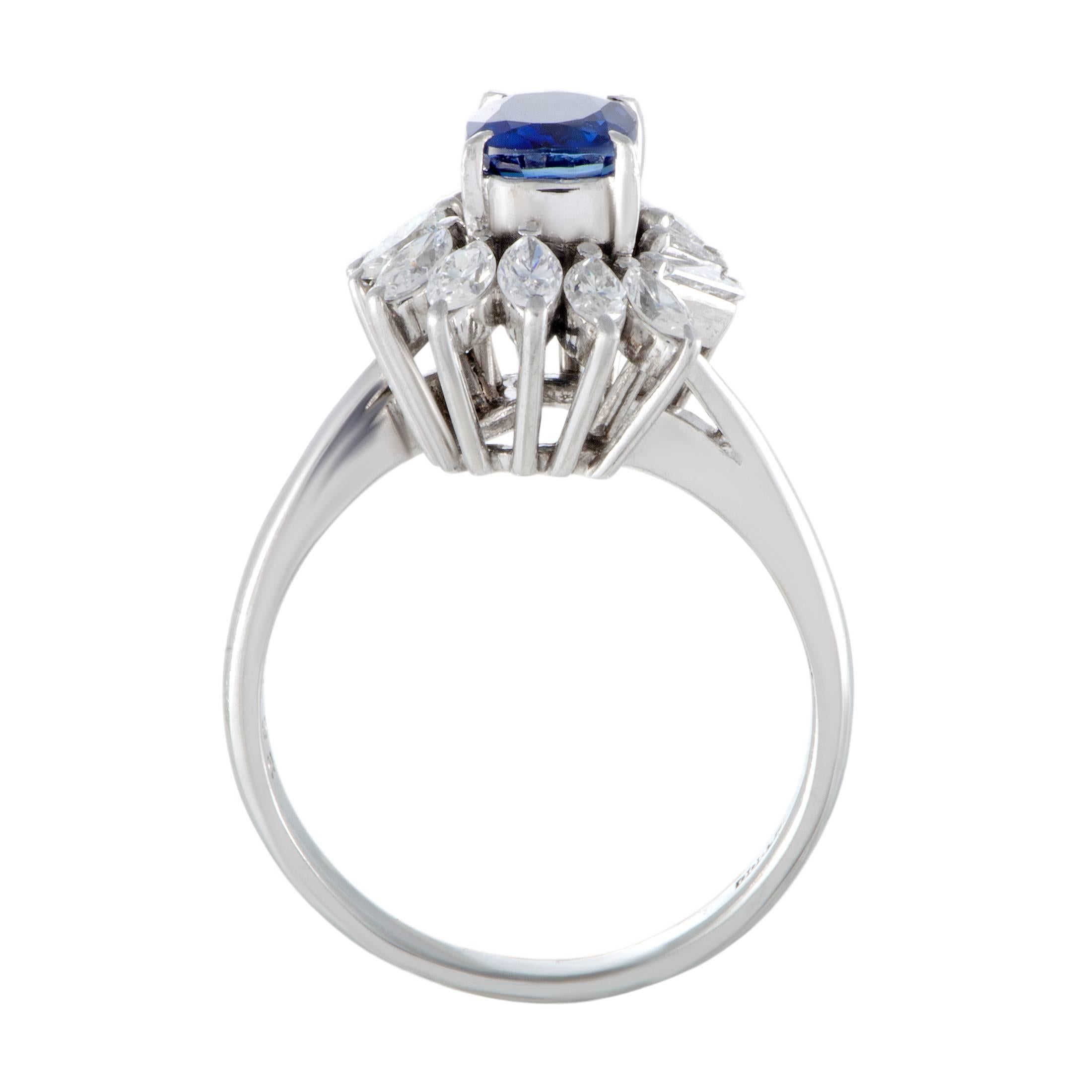 Beautifully made of elegant platinum and splendidly decorated with a luxurious blend of sapphire and diamond stones, this gorgeous ring offers an incredibly refined appearance. The sapphire weighs 0.98 carats while the diversely cut diamonds amount