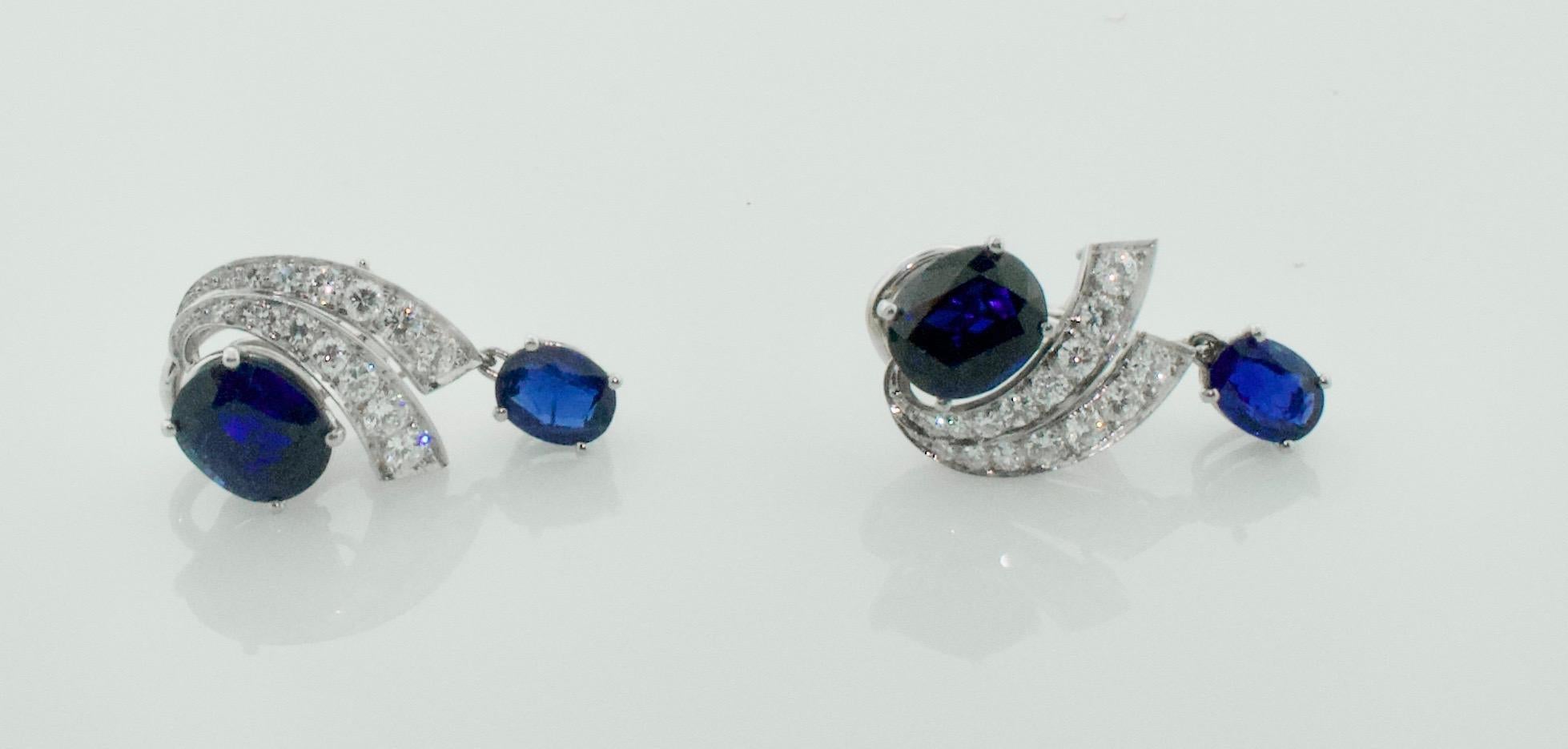 Sapphire and Diamond Platinum Earrings circa 1940's 7.10 cts. of Sapphire
Two Oval Sapphires weighing 5.50 carats approximately [bright with no imperfections visible to the naked eye]
Two Oval Sapphires weighing 1.60 carats approximately [bright
