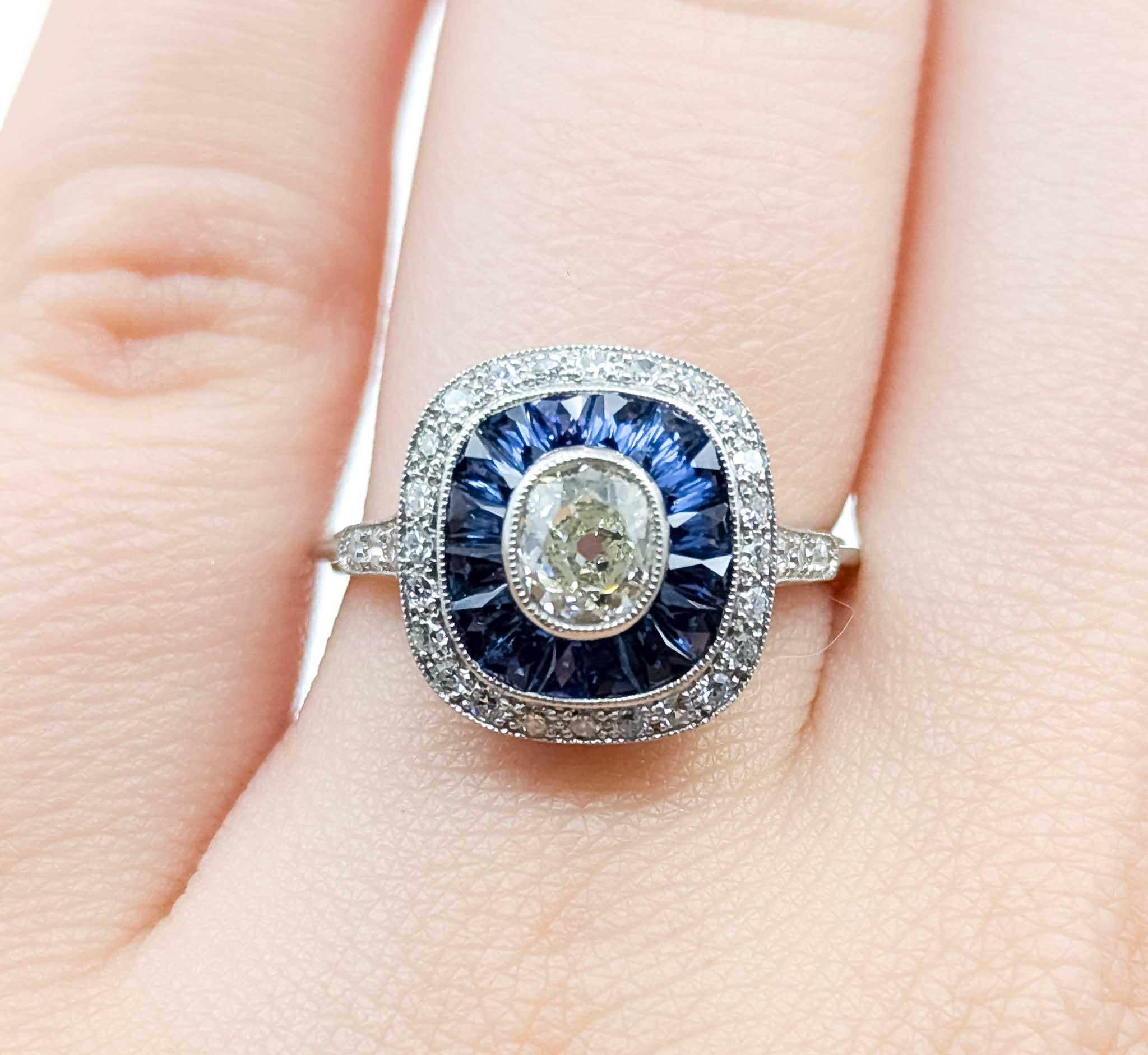 Donna Anello in platino con zaffiro e diamante in vendita