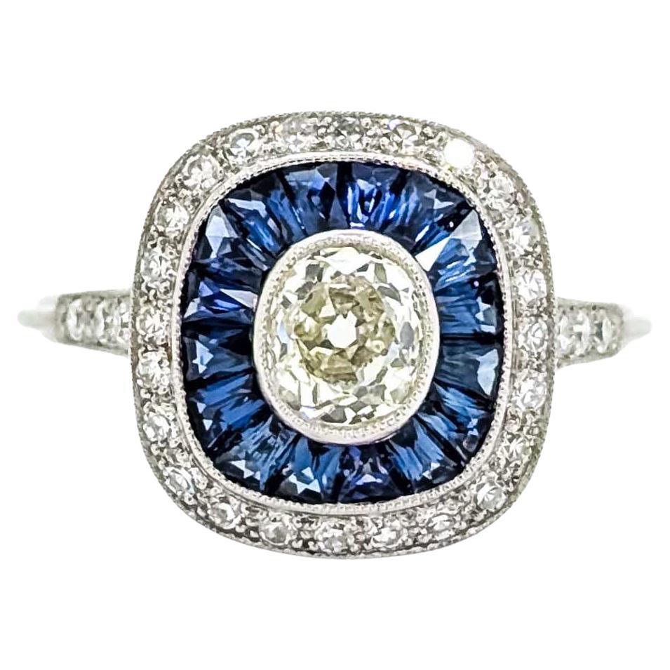 Anello in platino con zaffiro e diamante