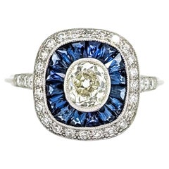 Anello in platino con zaffiro e diamante