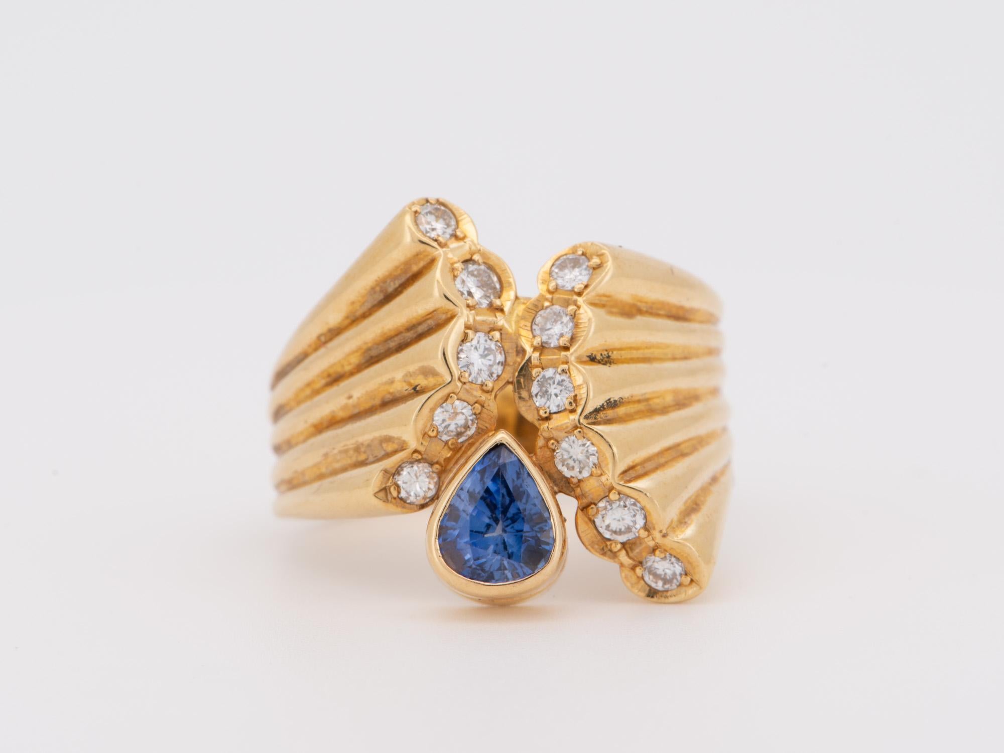 ♥ Sapphire and Diamond Ribbed Ring 18K Gold
♥ The face of the ring measures 14mm in width (East West direction), 16mm in length (North South direction), and sits 3.8mm tall from the finger. The band is 4.9mm wide.

♥ US size 5.75 (Free resizing up