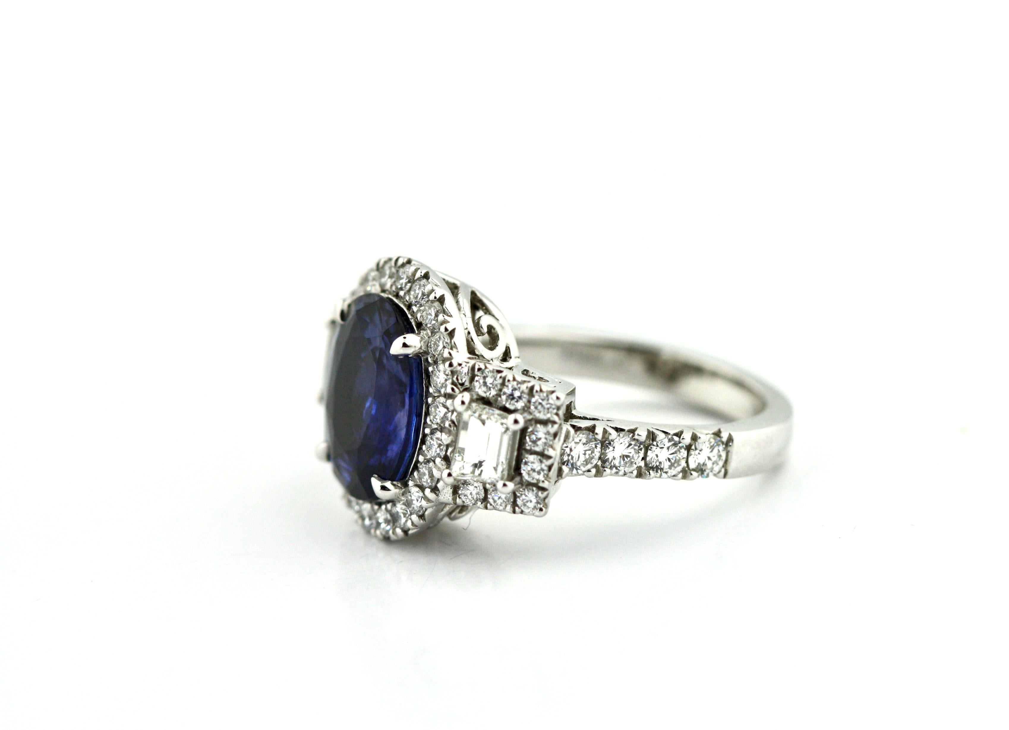 
Sapphire and Diamond Ring 
The oval-shaped sapphire weighing 4.14 carats, set within a mounting comprised of diamonds weighing a total of 1.40 carats
mounted in platinum 
12.02 grams (gross), size 6
Authentication: 
Accompanied by GIA report no.