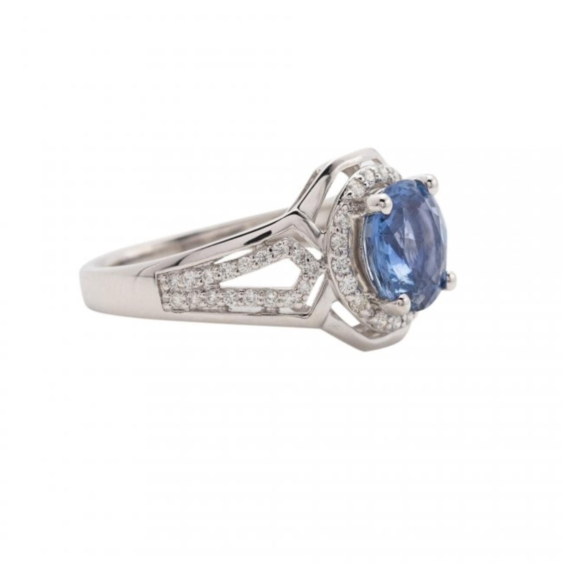 Sapphire and Diamond Ring 
The cushion-shaped sapphire weighing 2.37 carats, set within a ballerina mounting comprised of round diamonds, diamonds weighing approximately .31 cts. 
mounted in platinum
7.40 grams (gross) , size 7 3/4 

Authentication: