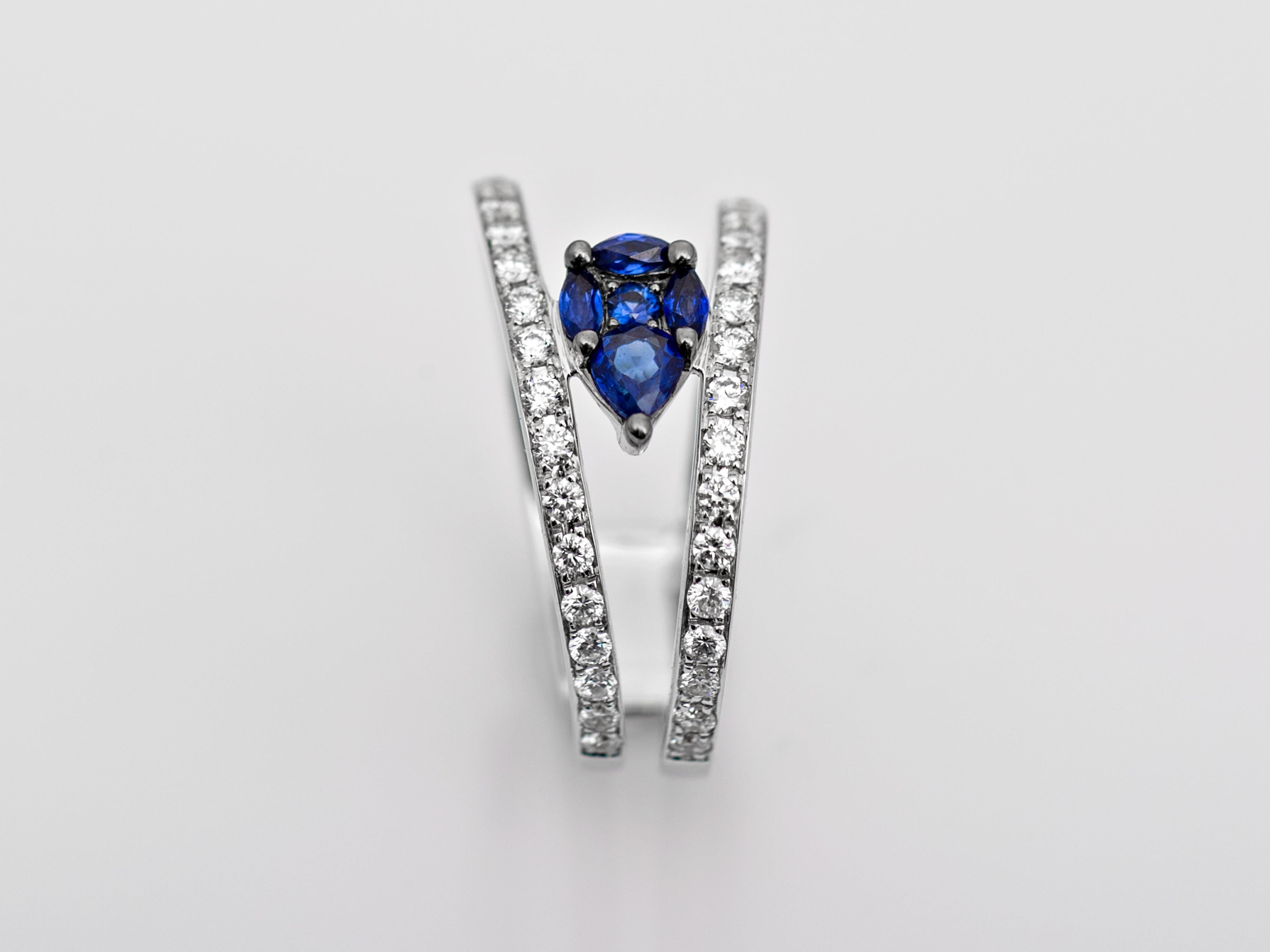 Round Cut Sapphire and Diamond Ring
