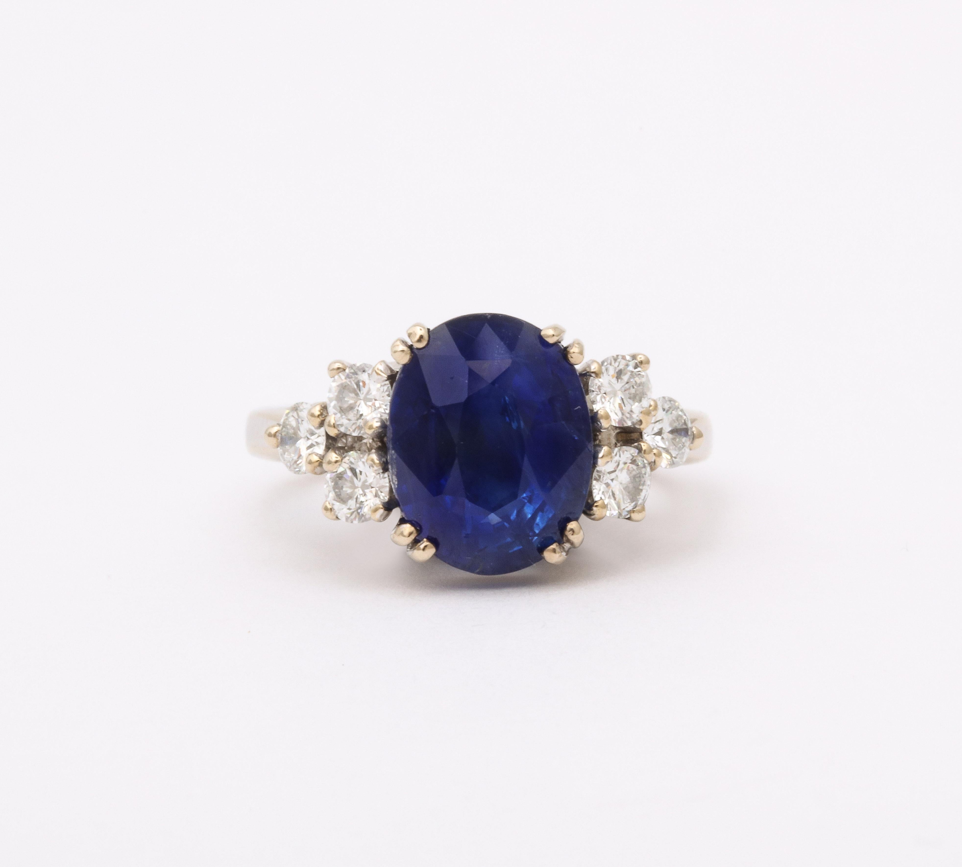 Oval Cut Sapphire and Diamond Ring For Sale