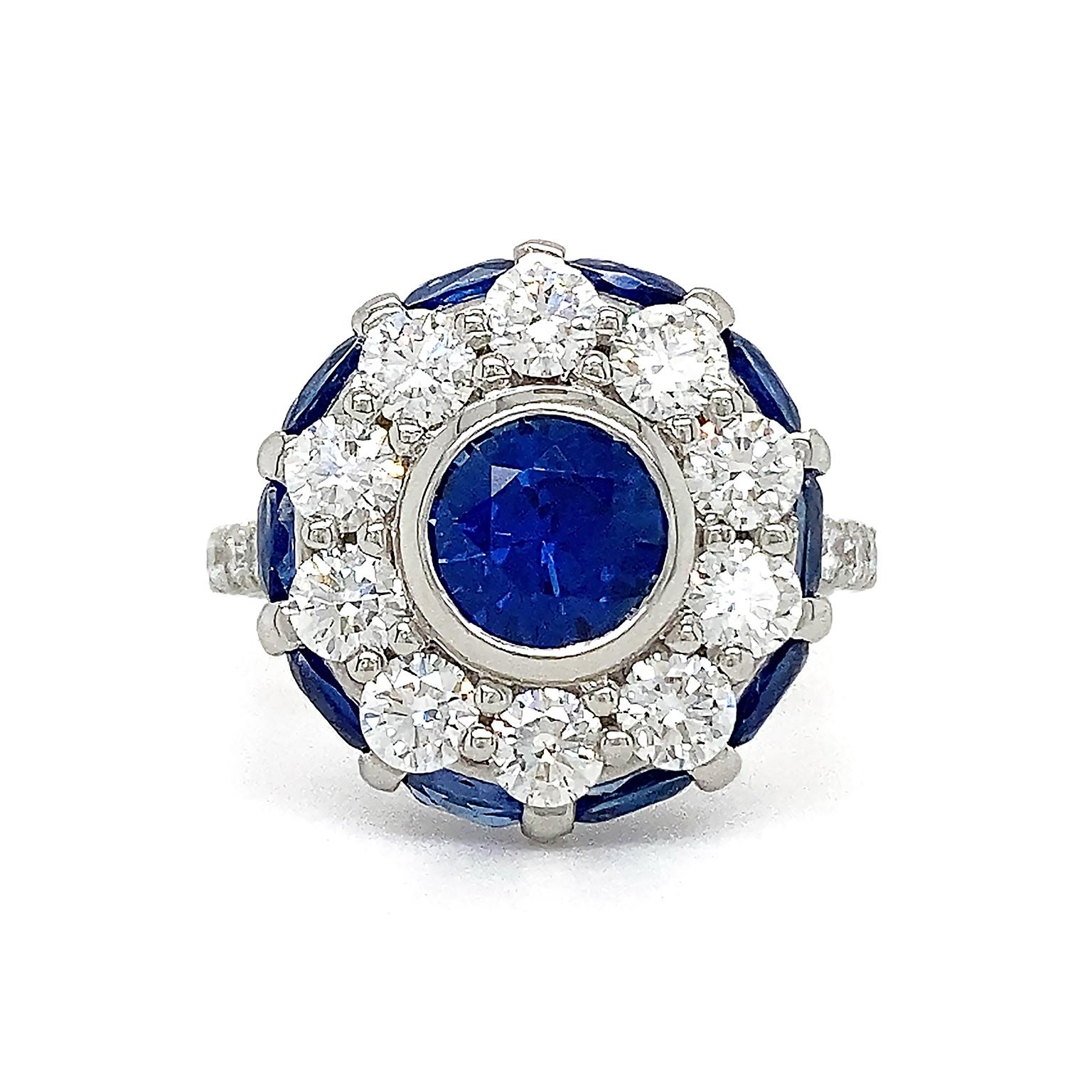 Brilliant Cut Platinum Sapphire and Diamond Halo Ring For Sale