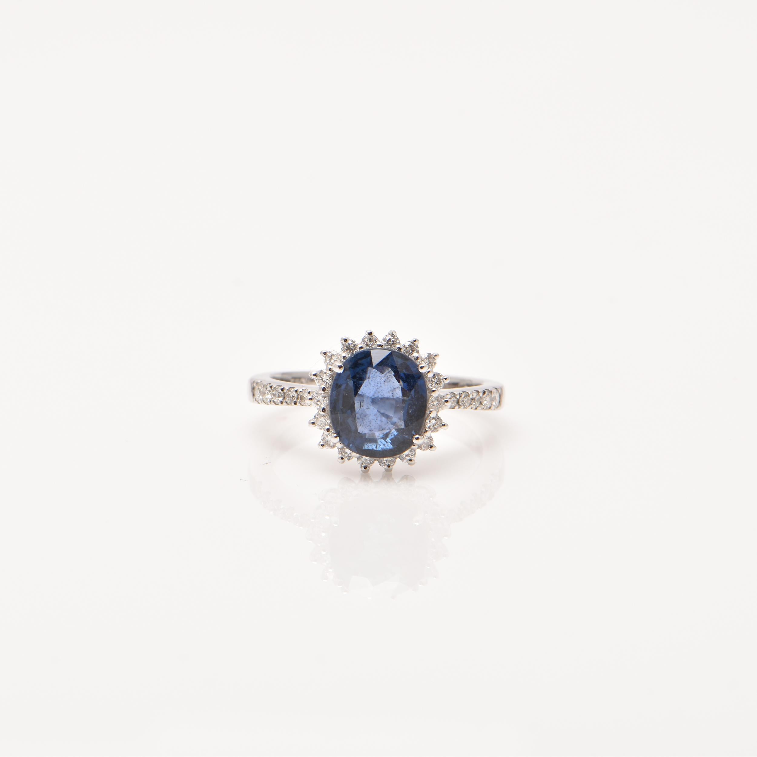 Round Cut Sapphire and Diamond Ring For Sale