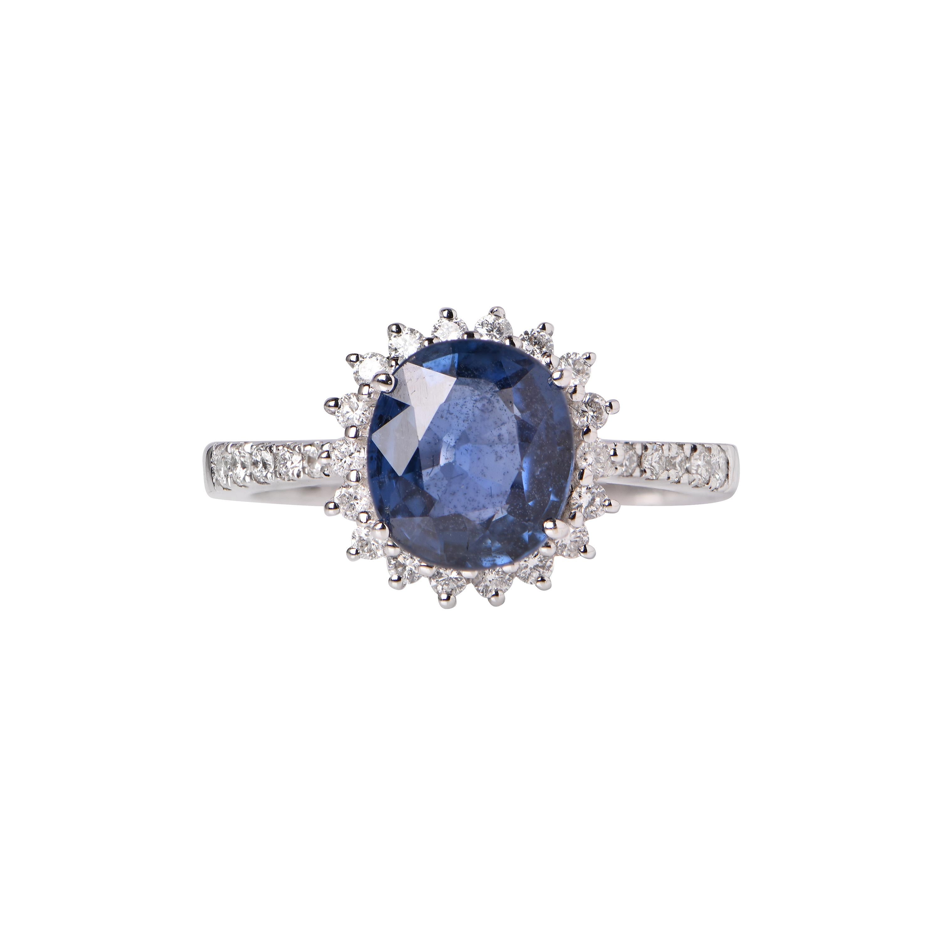 An 18ct White Gold ring showcasing a Sapphire (2.47ct), and 28 Diamonds totalling 0.31ct. This ring comes with a valuation certificate.
