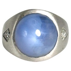 Bague en or blanc 14 carats avec saphir et diamants