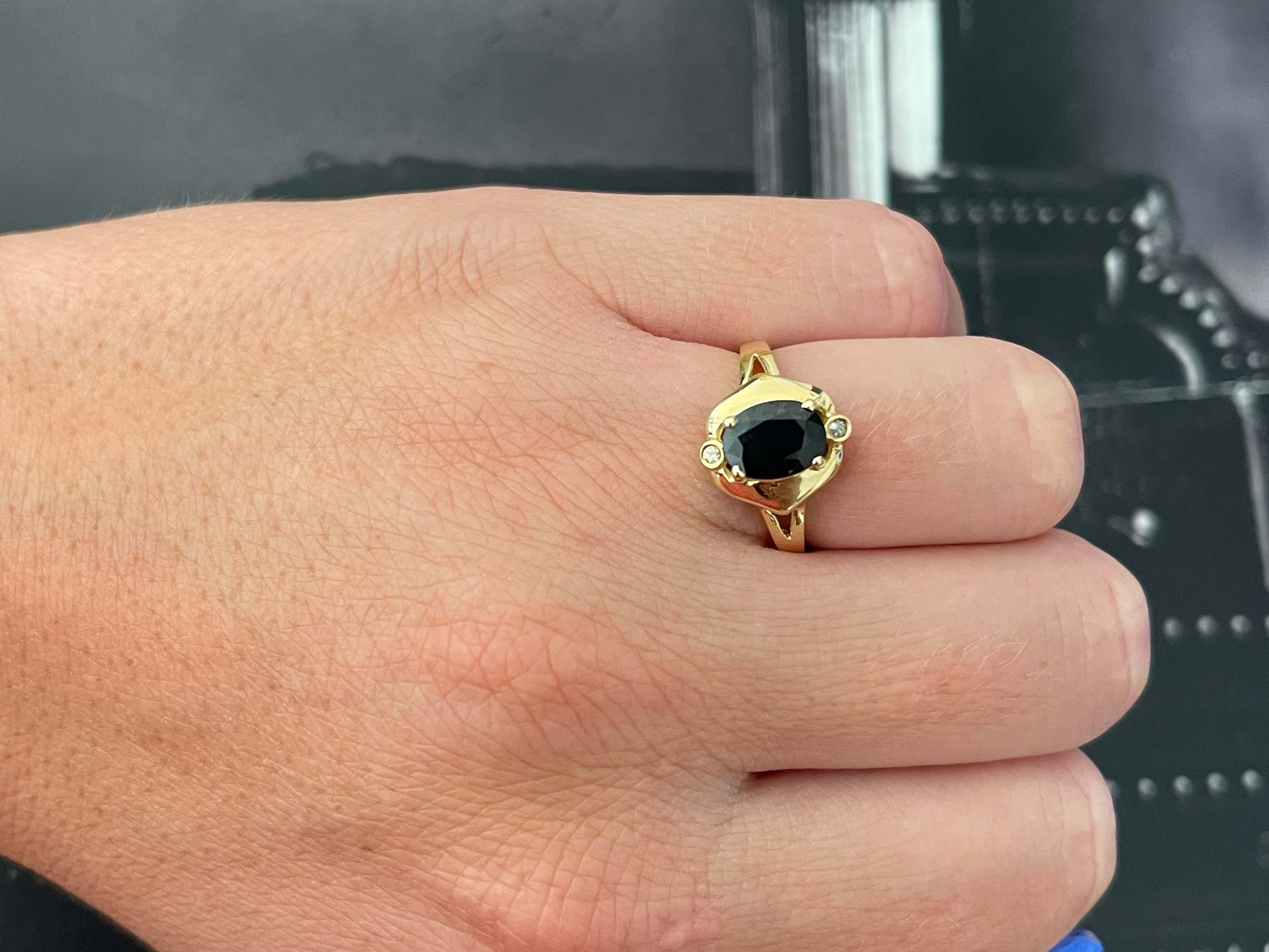 Item Specifications:

Metal: 14K Yellow Gold

Style: Statement Ring

Ring Size: 6 (resizing available for a fee)

Total Weight: 2.6 Grams

Ring Height: 12.22 mm

Gemstone Specifications:

Gemstone: 1 blue sapphire

Shape: oval

Sapphire