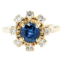 Anello con zaffiro e diamante in oro giallo 14k