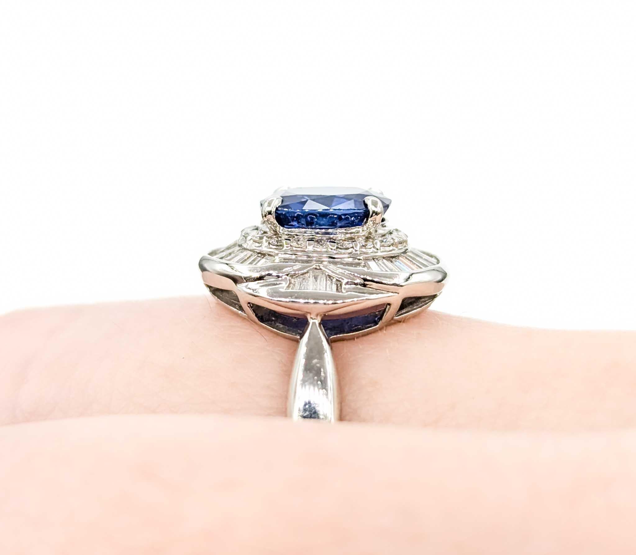 Timeless Sapphire and Diamond Ring in Platinum

Introducing this beautiful sapphire ring, crafted in platinum. The ring features a 1.87ct GIA Sri Lanka sapphire centerpiece with .40ctw round and baguette diamonds, creating a stunning and