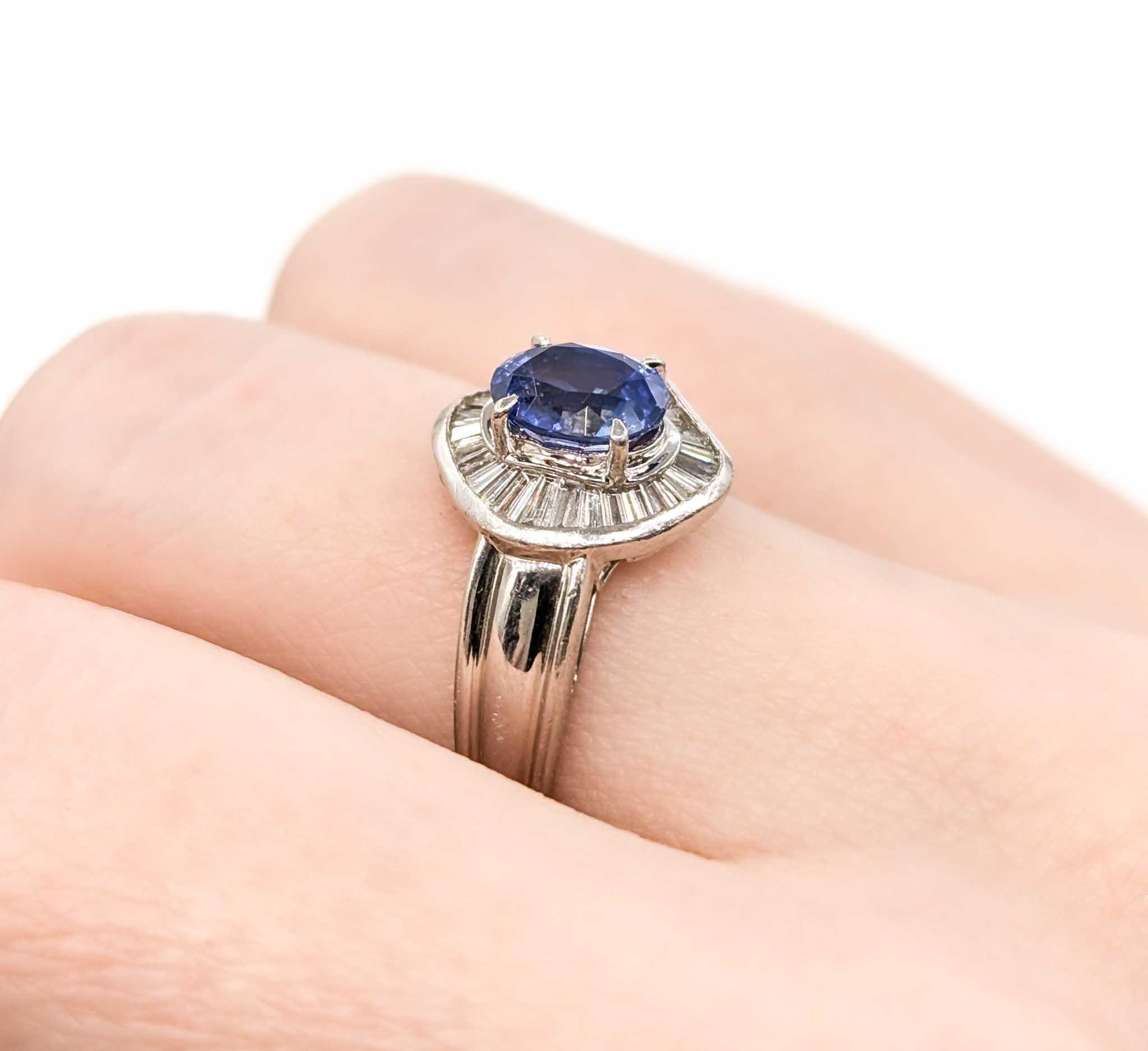 Timeless Sapphire and Diamond Ring in 900pt Platinum

This stunning ring is crafted in 900pt platinum and features a 1.46ct sapphire centerpiece, the birthstone for September. The sapphire is complemented by 0.46ctw of baguette diamonds, adding an